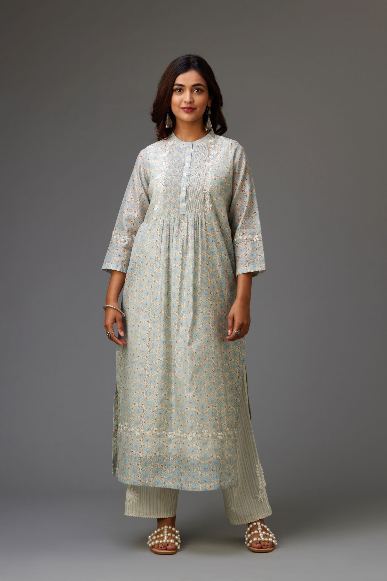 Silk chanderi blue and grey hand block printed straight kurta set highlighted with pin tucks at yoke.