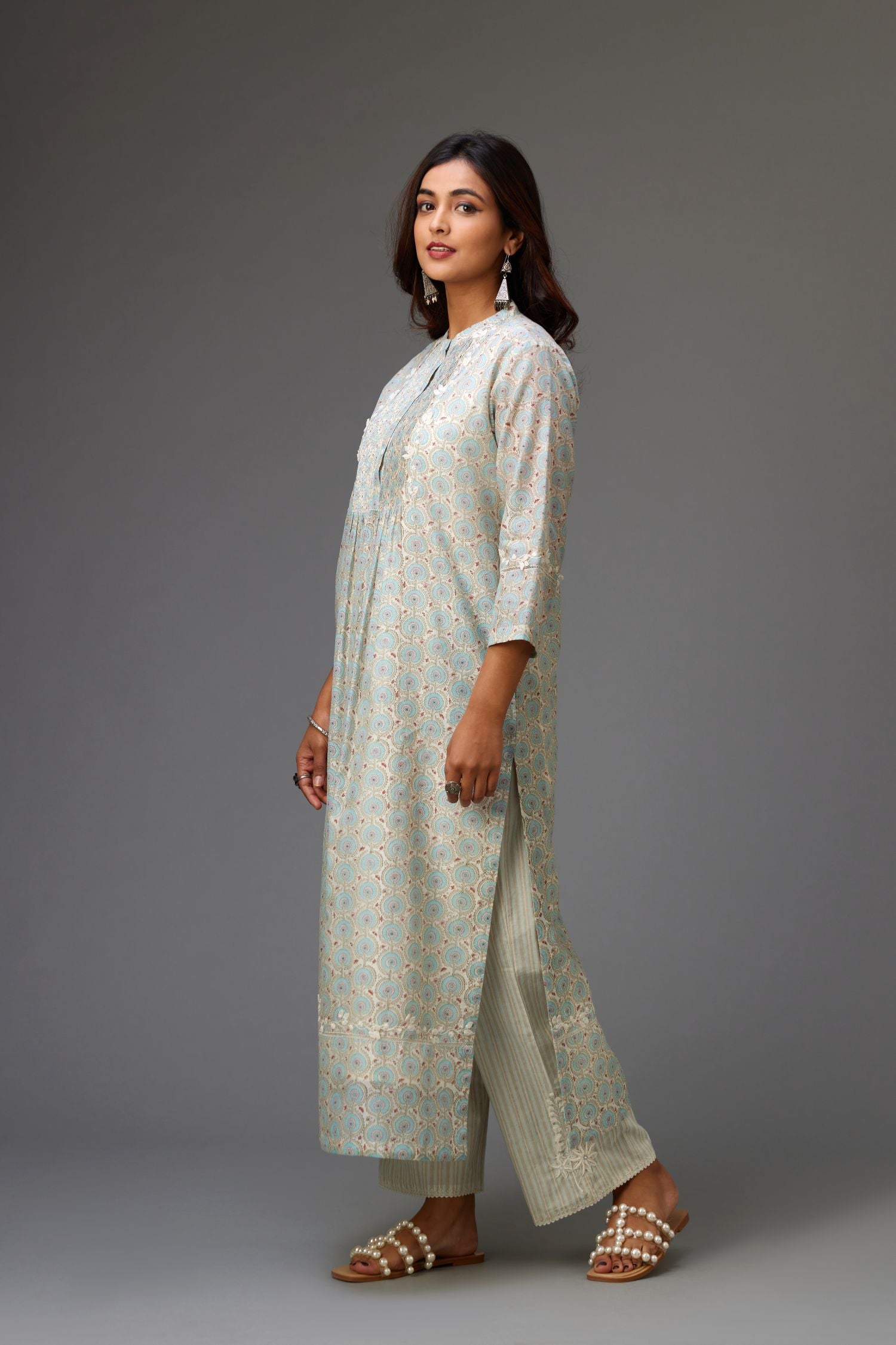 Silk chanderi blue and grey hand block printed straight kurta set highlighted with pin tucks at yoke.