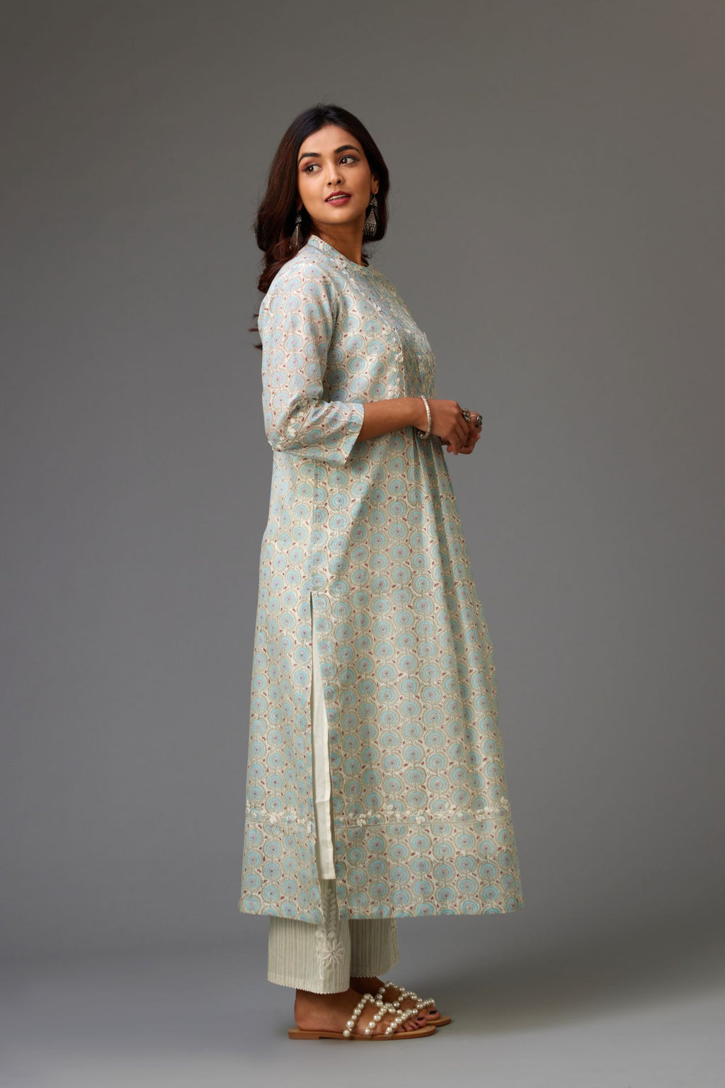 Silk chanderi blue and grey hand block printed straight kurta set highlighted with pin tucks at yoke.