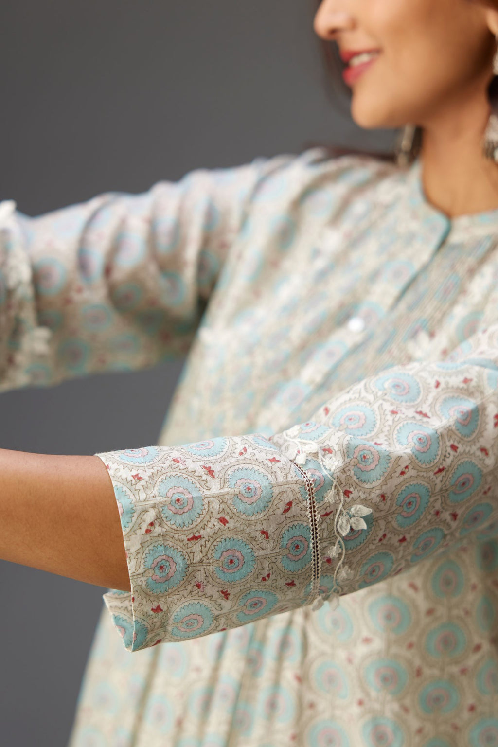 Silk chanderi blue and grey hand block printed straight kurta set highlighted with pin tucks at yoke.