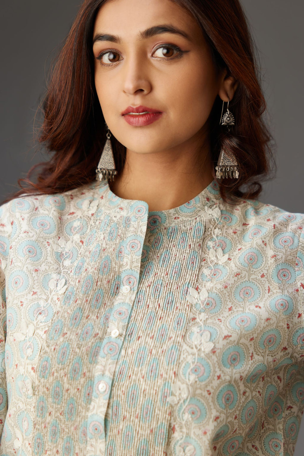 Silk chanderi blue and grey hand block printed straight kurta set highlighted with pin tucks at yoke.