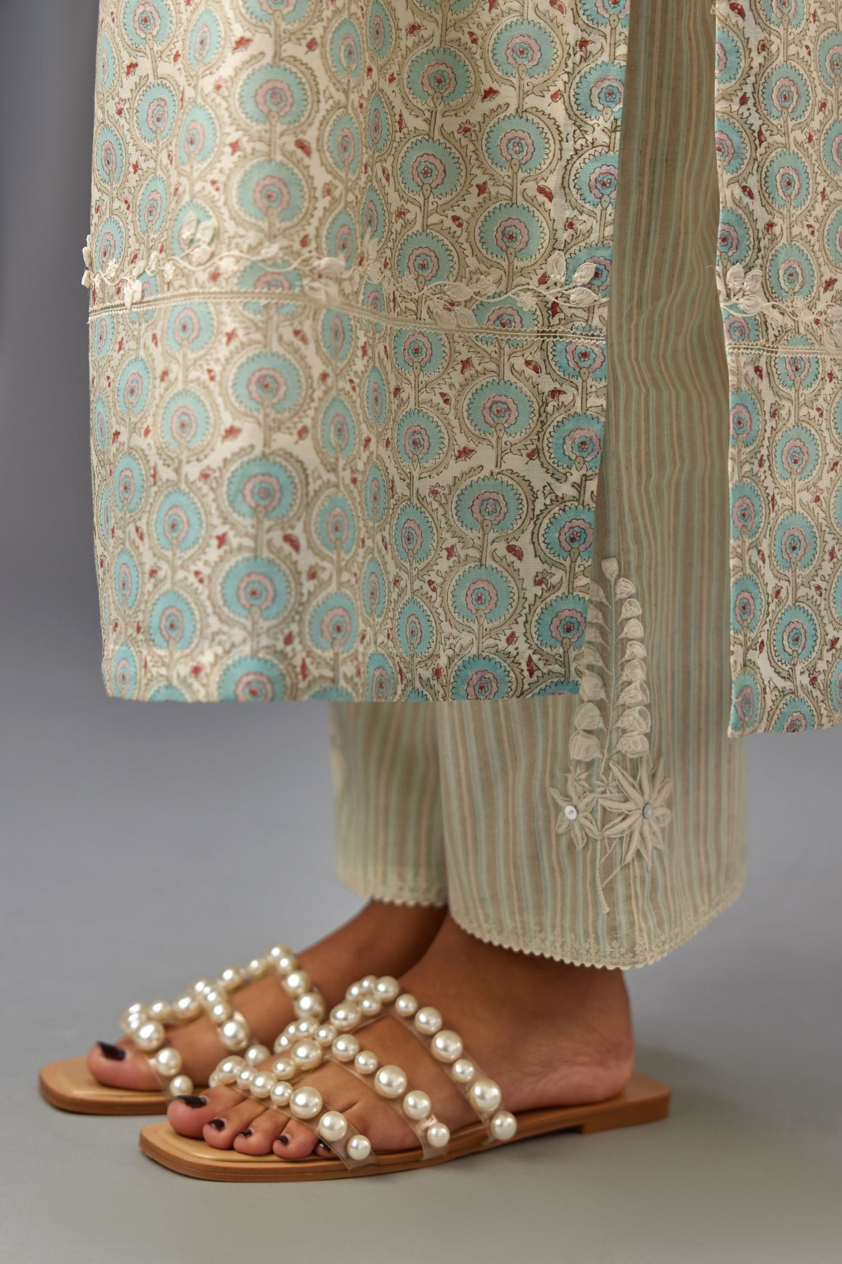 Silk chanderi blue and grey hand block printed straight kurta set highlighted with pin tucks at yoke.