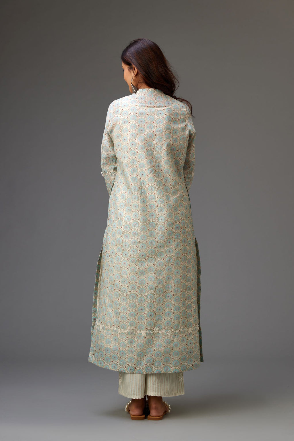 Silk chanderi blue and grey hand block printed straight kurta set highlighted with pin tucks at yoke.