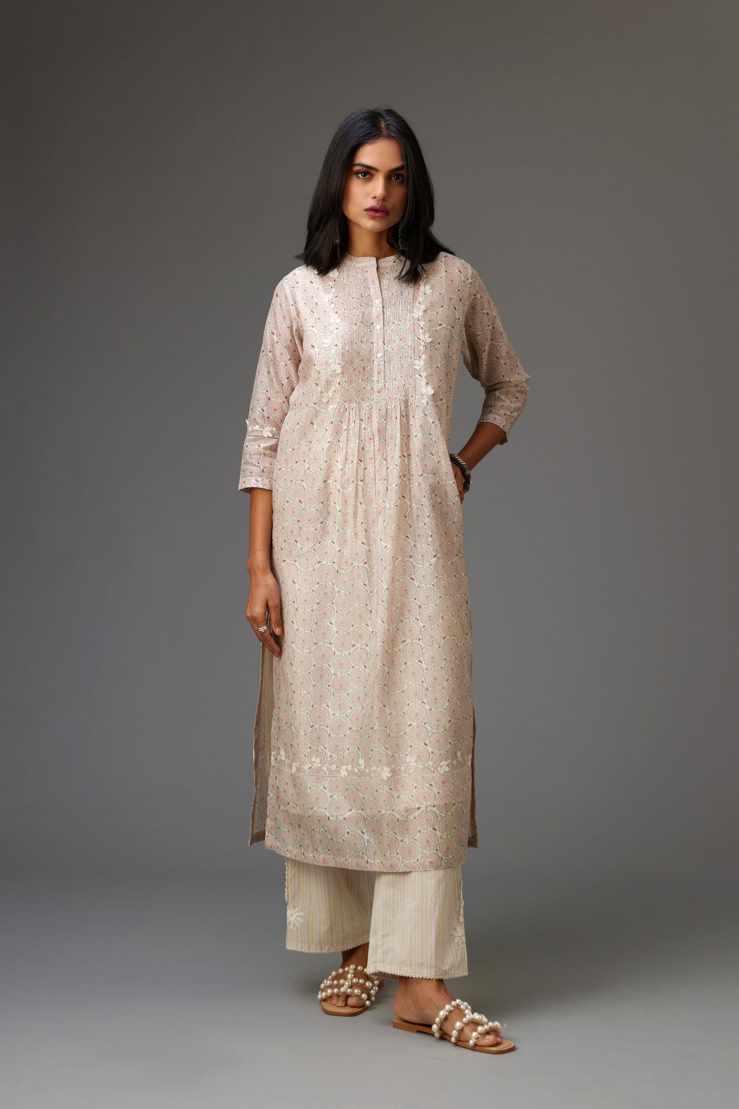 Silk chanderi blue and grey hand block printed straight kurta set highlighted with pin tucks at yoke.