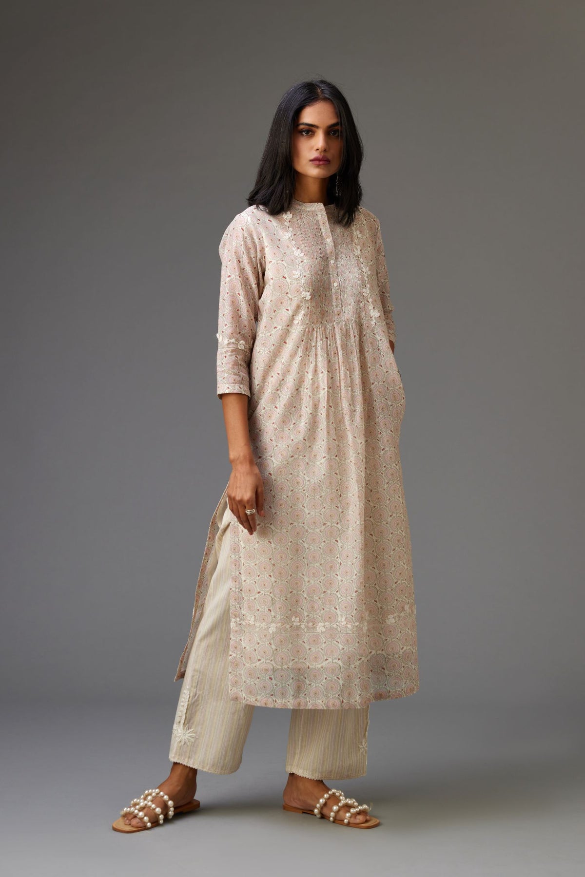 Silk chanderi blue and grey hand block printed straight kurta set highlighted with pin tucks at yoke.