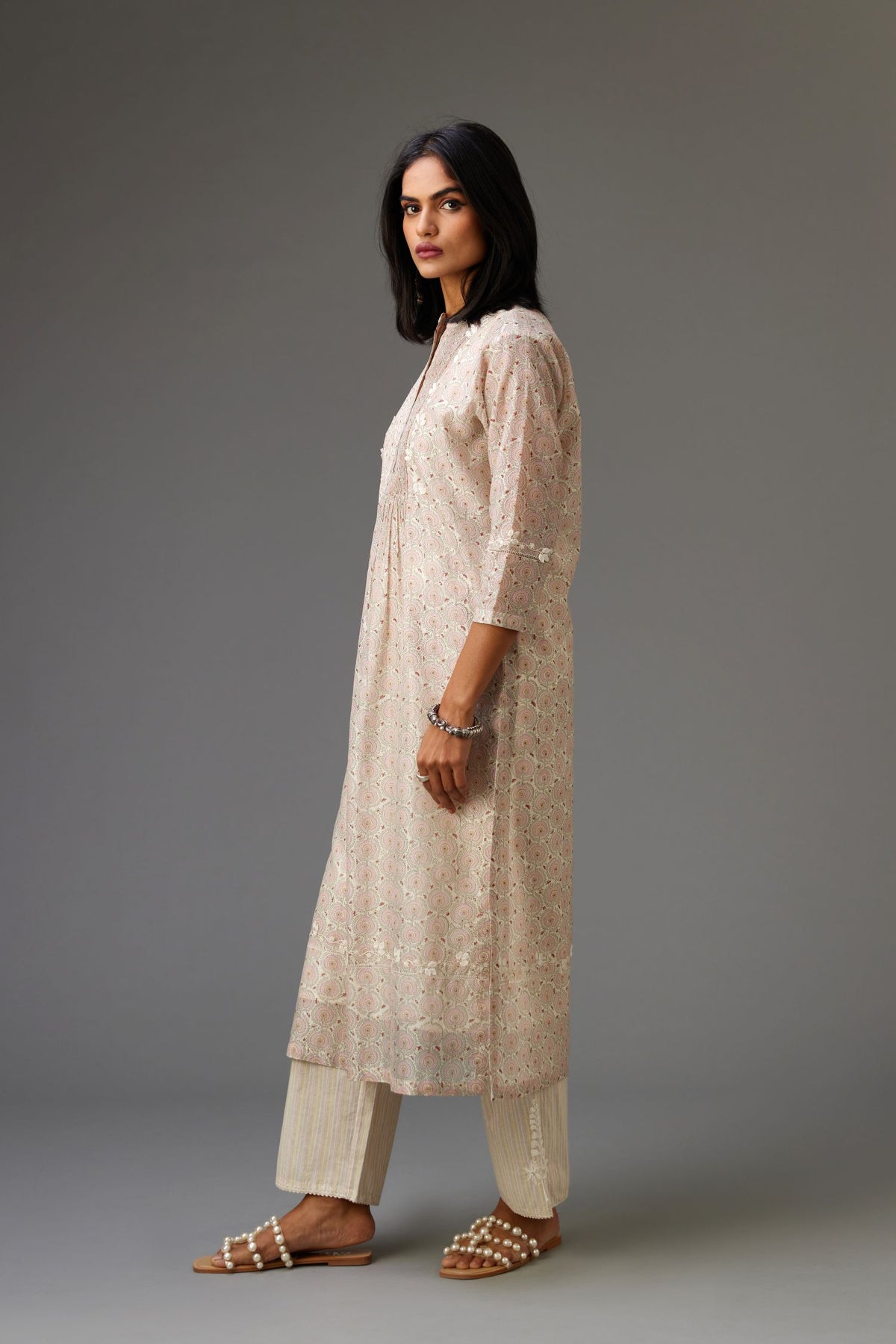 Silk chanderi blue and grey hand block printed straight kurta set highlighted with pin tucks at yoke.