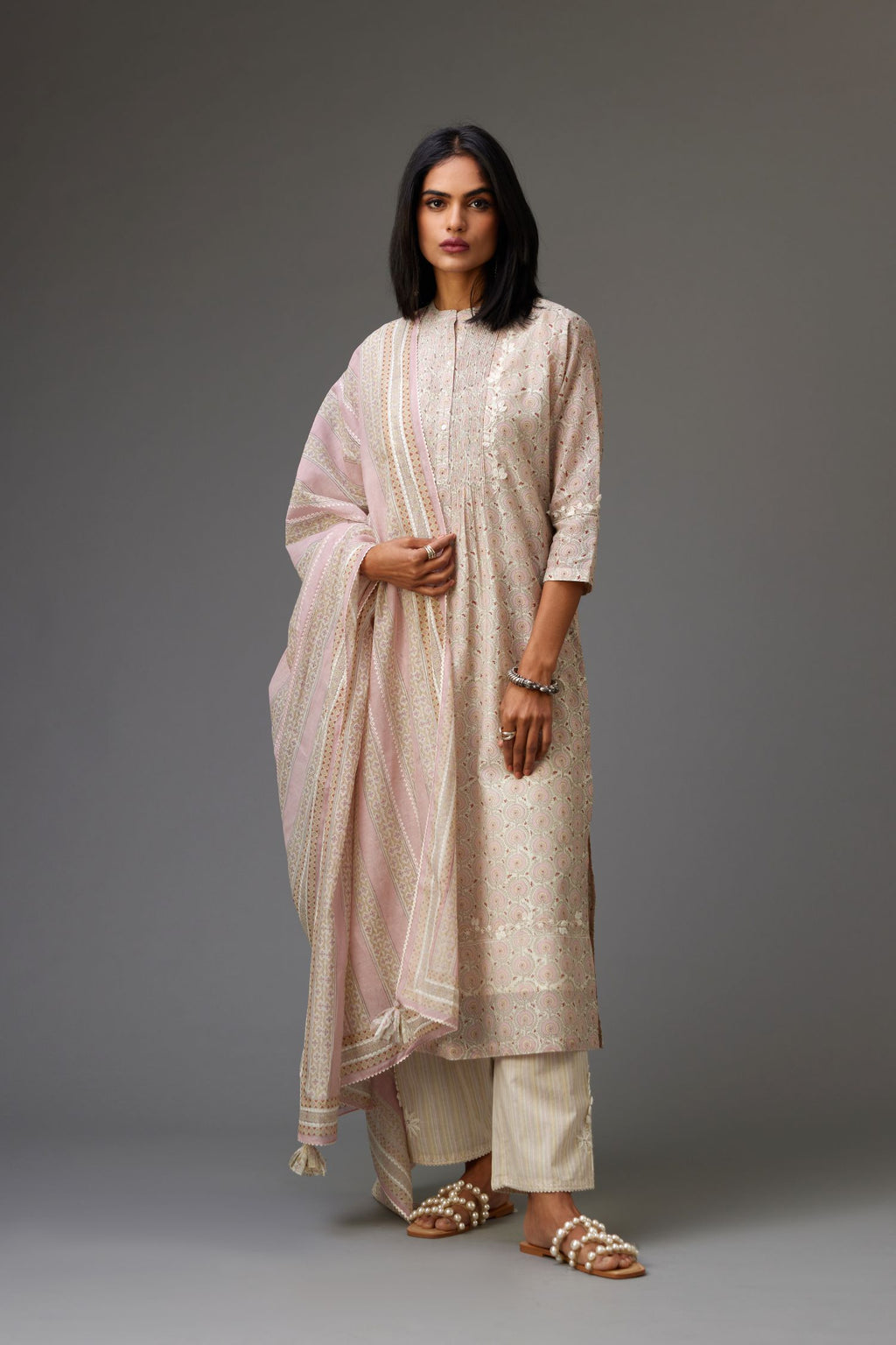 Silk chanderi blue and grey hand block printed straight kurta set highlighted with pin tucks at yoke.