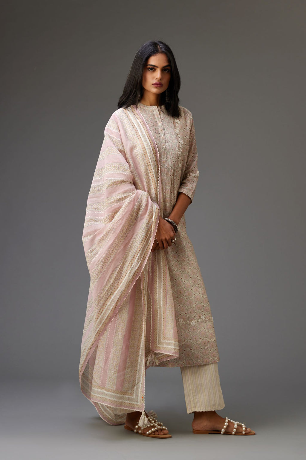 Silk chanderi blue and grey hand block printed straight kurta set highlighted with pin tucks at yoke.