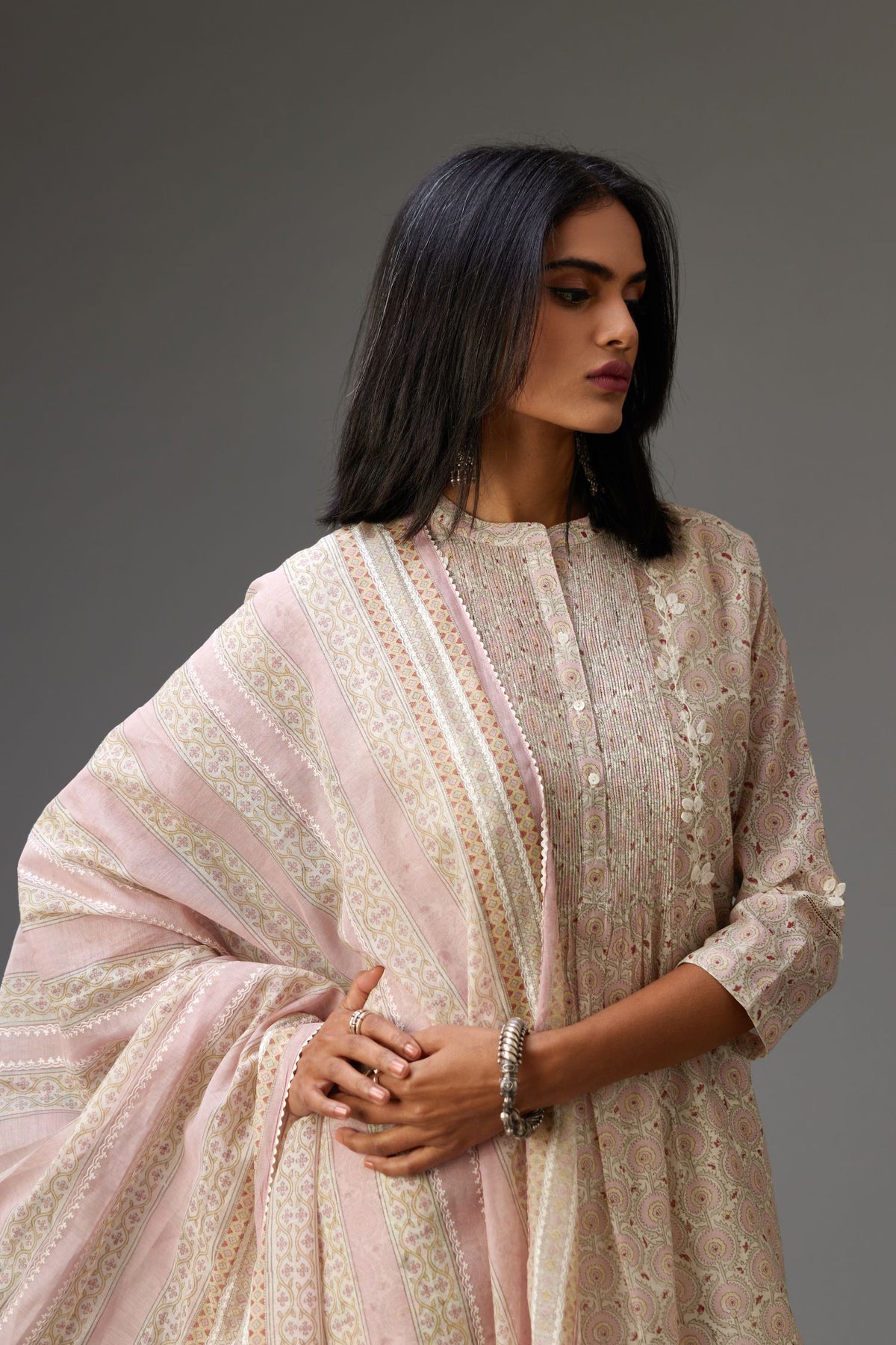 Silk chanderi blue and grey hand block printed straight kurta set highlighted with pin tucks at yoke.