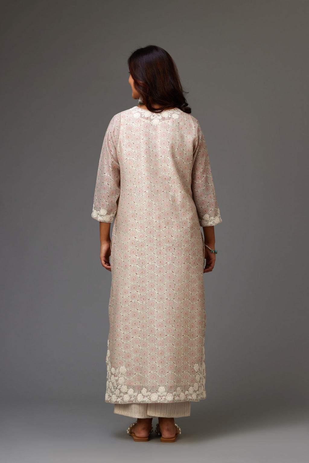 Pink and grey Silk Chanderi hand-block printed kurta set with appliqué embroidery, highlighted with lace and sequins.