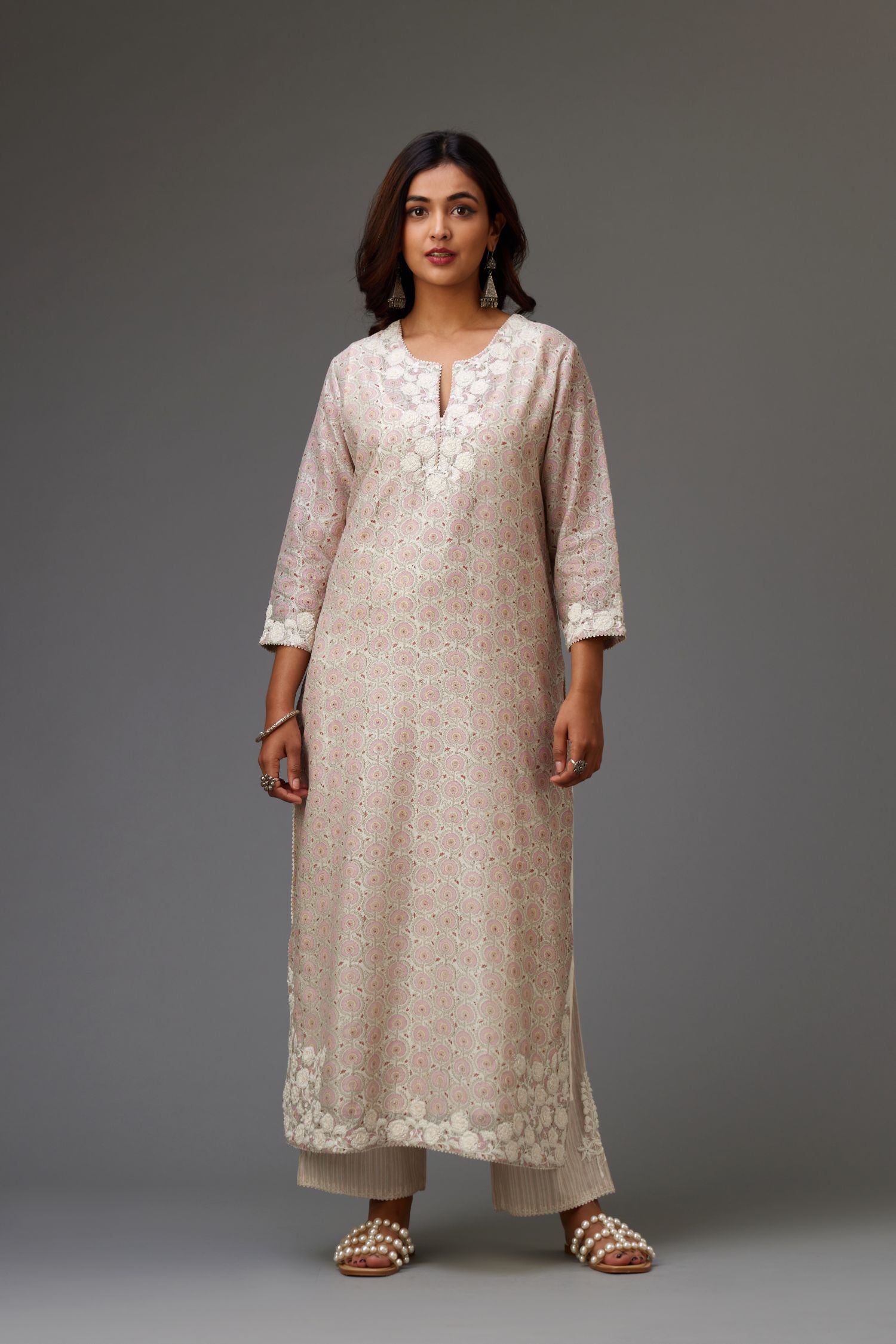 Pink and grey Silk Chanderi hand-block printed kurta set with appliqué embroidery, highlighted with lace and sequins.