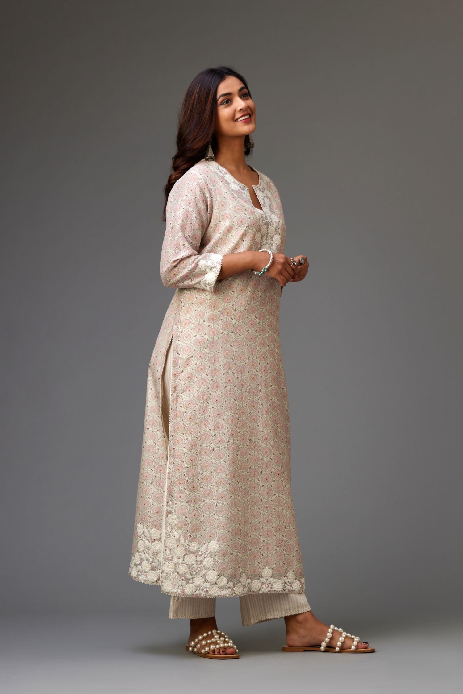 Pink and grey Silk Chanderi hand-block printed kurta set with appliqué embroidery, highlighted with lace and sequins.