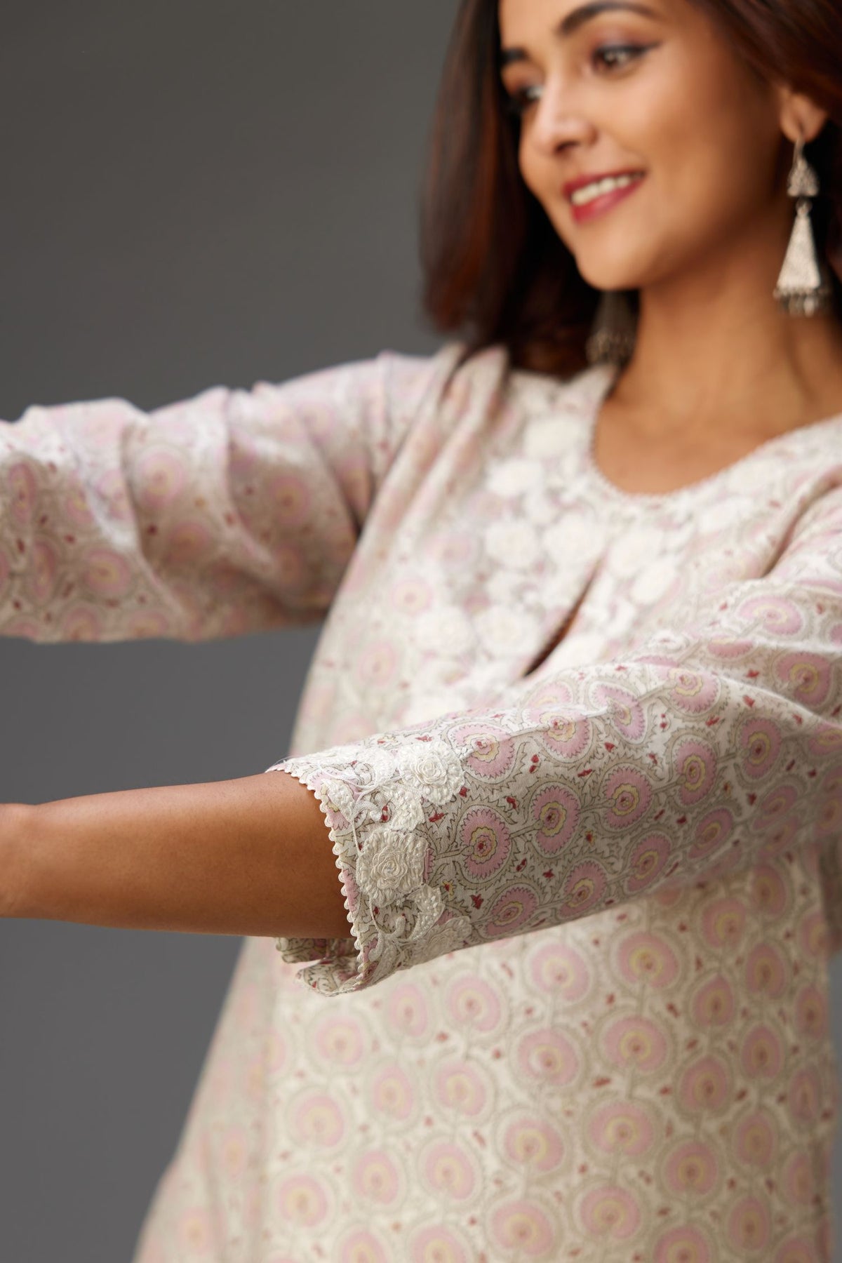 Pink and grey Silk Chanderi hand-block printed kurta set with appliqué embroidery, highlighted with lace and sequins.
