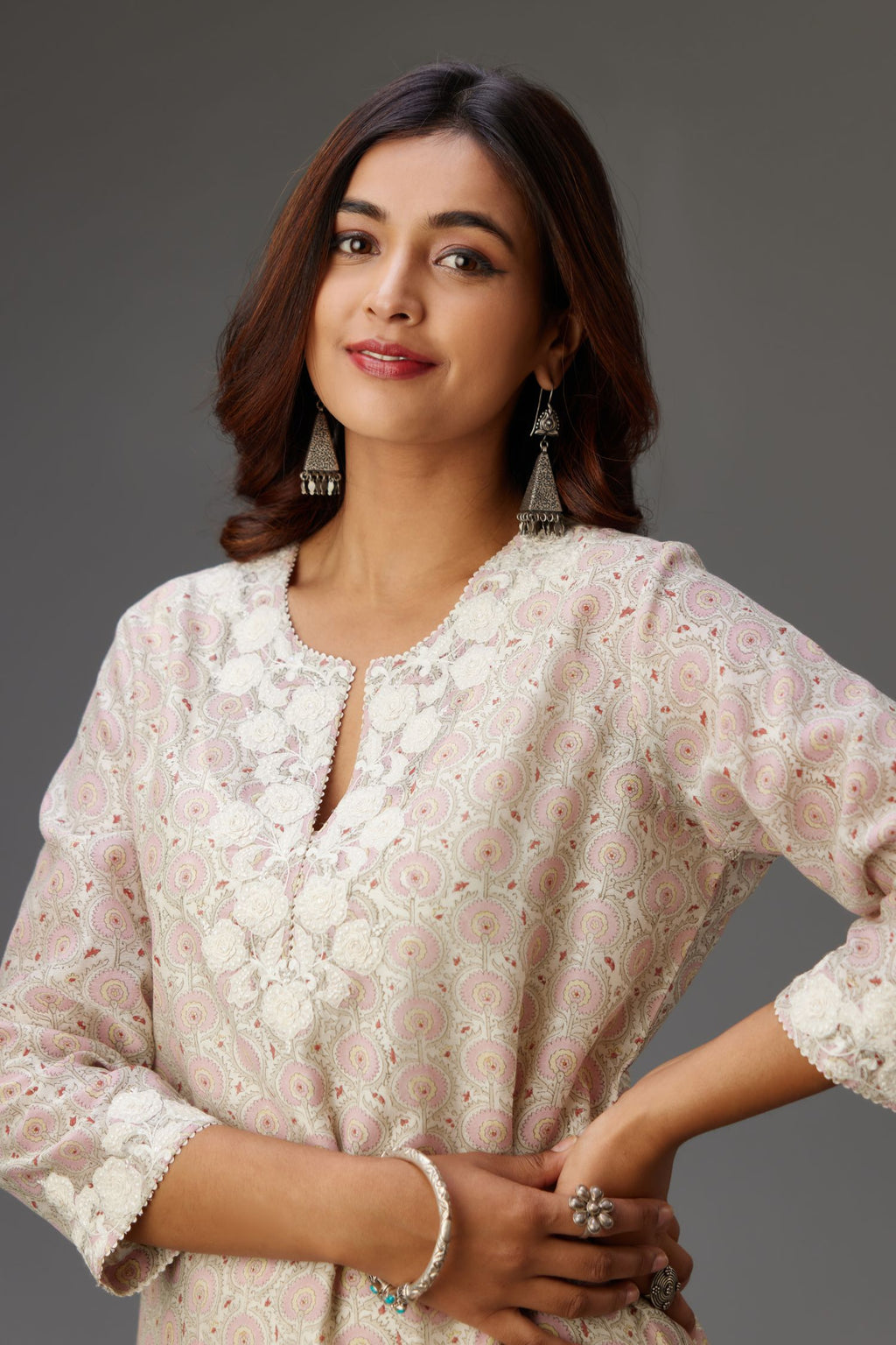 Pink and grey Silk Chanderi hand-block printed kurta set with appliqué embroidery, highlighted with lace and sequins.