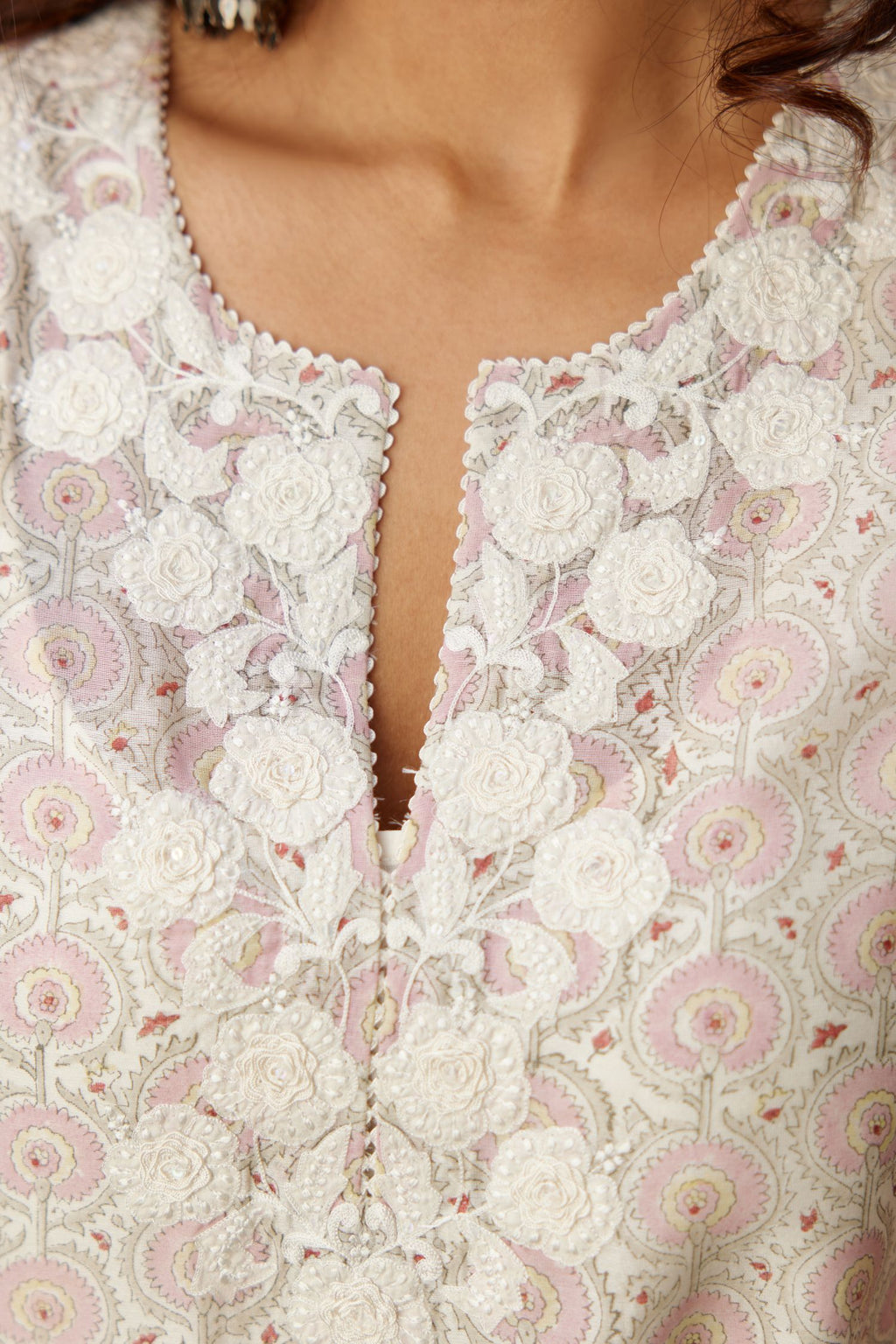 Pink and grey Silk Chanderi hand-block printed kurta set with appliqué embroidery, highlighted with lace and sequins.