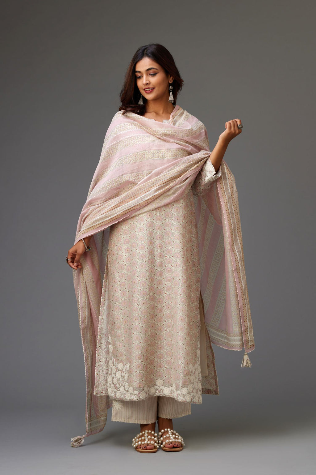 Pink and grey Silk Chanderi hand-block printed kurta set with appliqué embroidery, highlighted with lace and sequins.