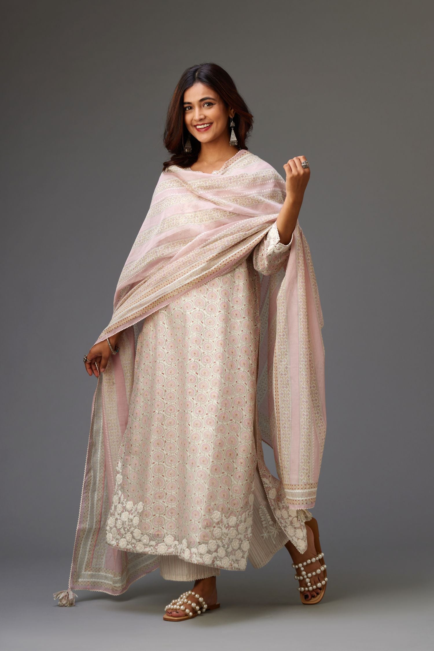 Pink and grey Silk Chanderi hand-block printed kurta set with appliqué embroidery, highlighted with lace and sequins.