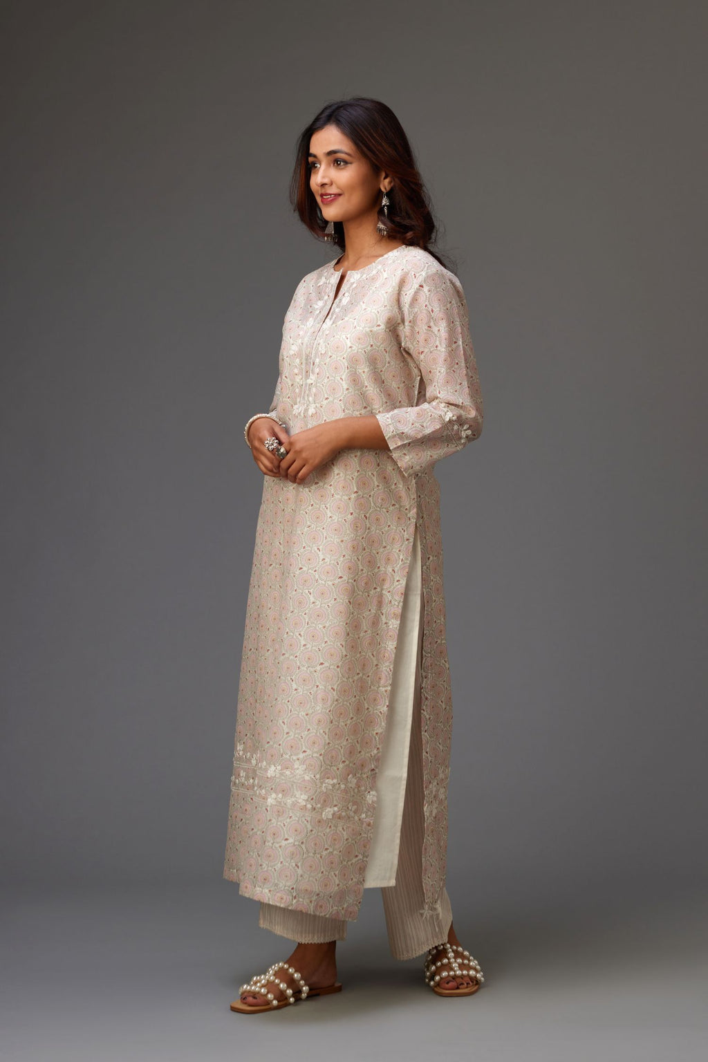 Silk chanderi hand-block printed straight kurta set with sequins work and chiffon flower embroidery.