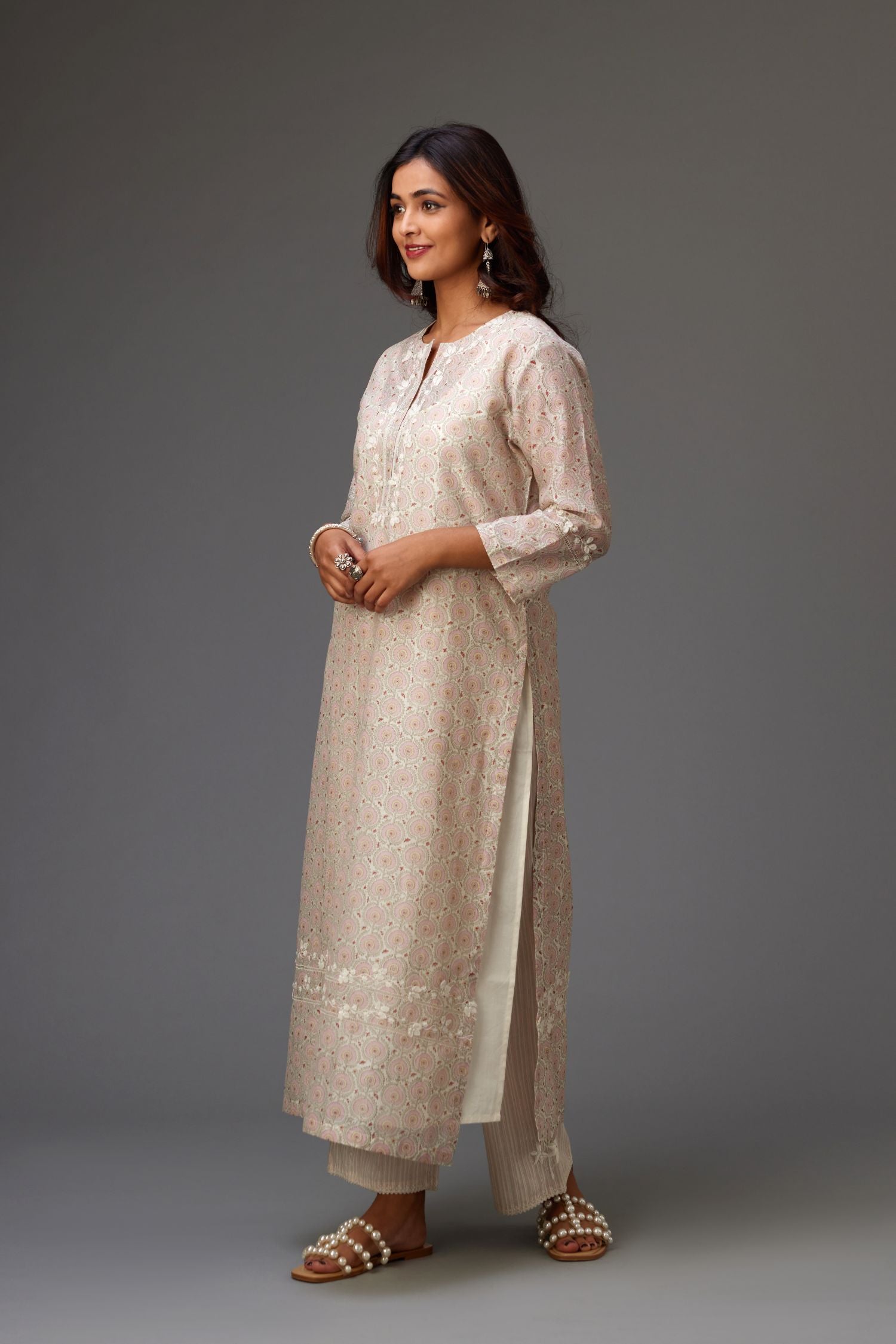 Silk chanderi hand-block printed straight kurta set with sequins work and chiffon flower embroidery.