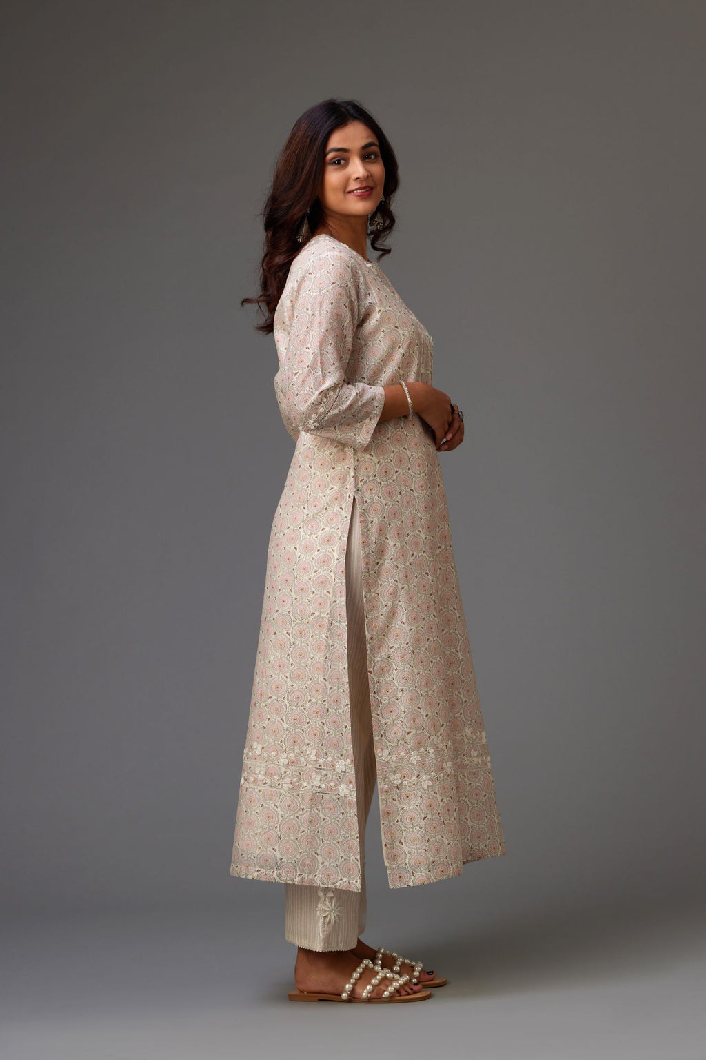 Silk chanderi hand-block printed straight kurta set with sequins work and chiffon flower embroidery.