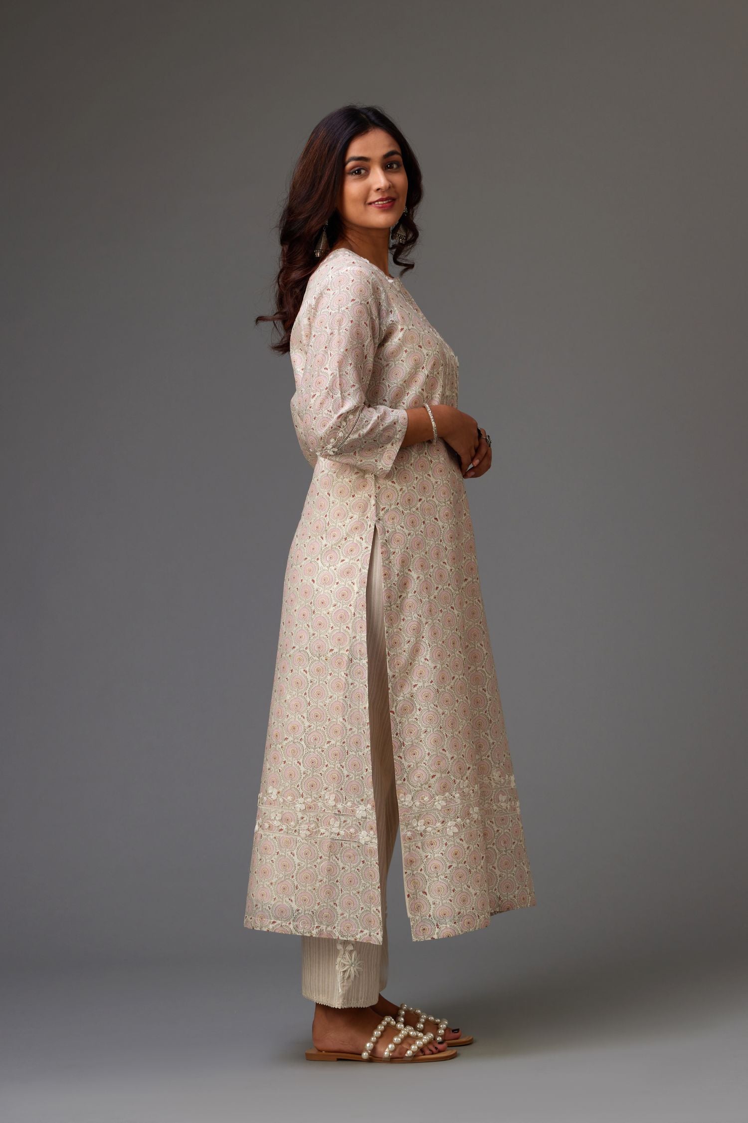 Silk chanderi hand-block printed straight kurta set with sequins work and chiffon flower embroidery.