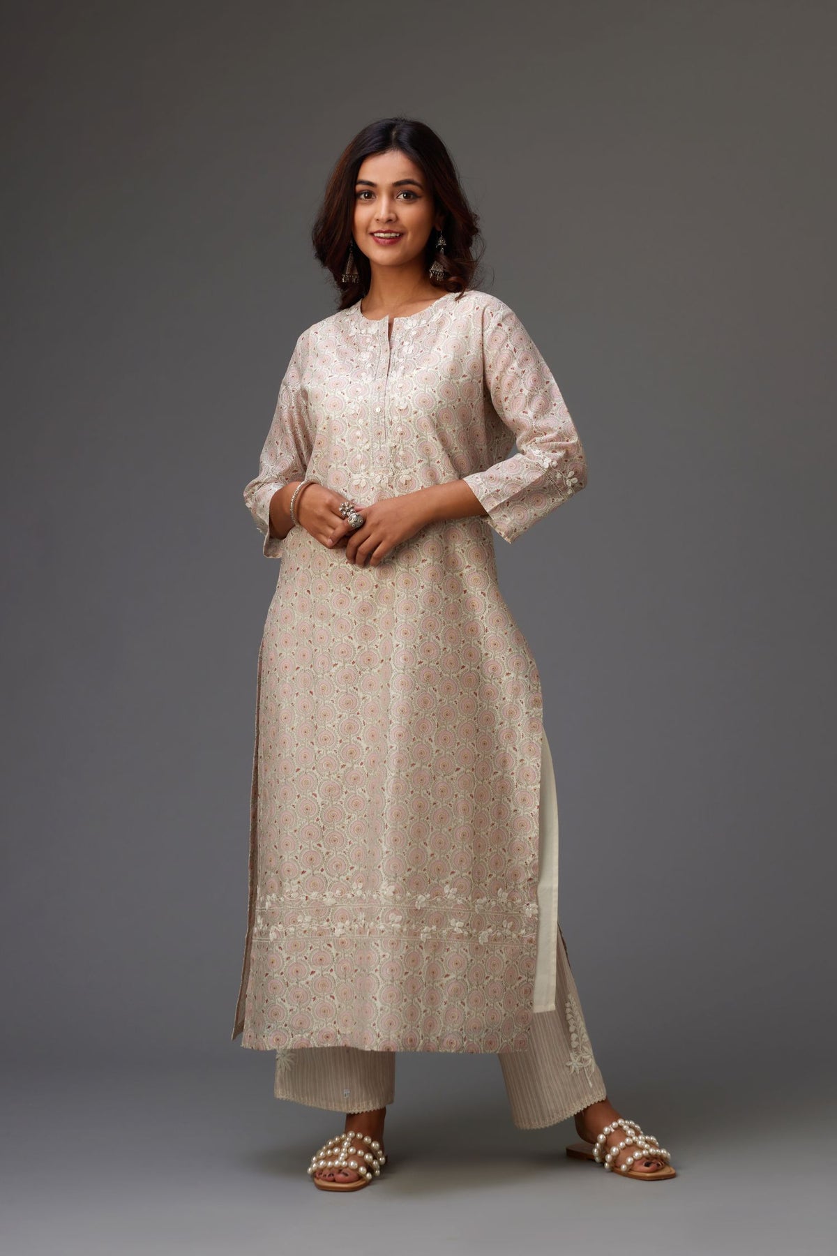 Silk chanderi hand-block printed straight kurta set with sequins work and chiffon flower embroidery.