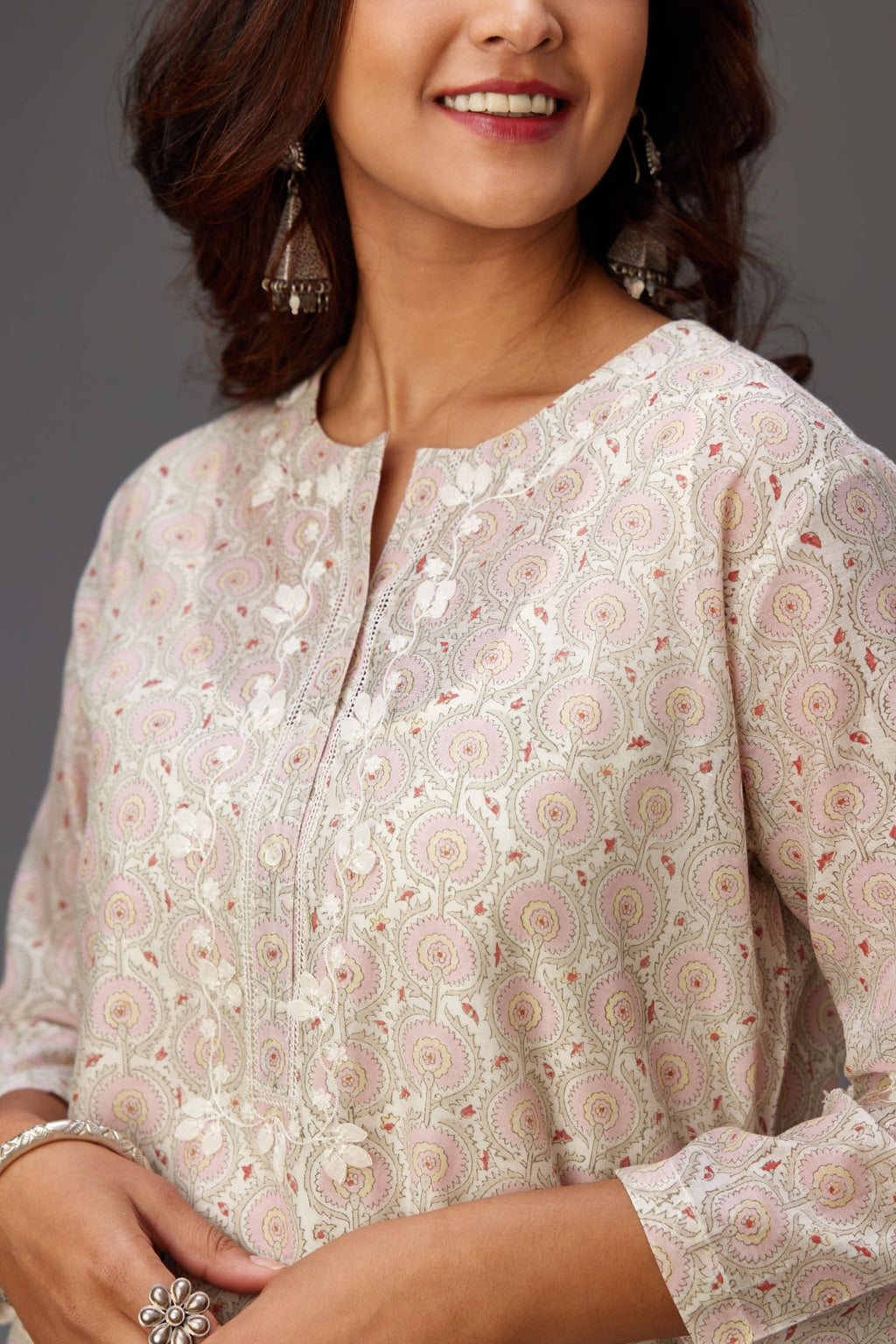 Silk chanderi hand-block printed straight kurta set with sequins work and chiffon flower embroidery.