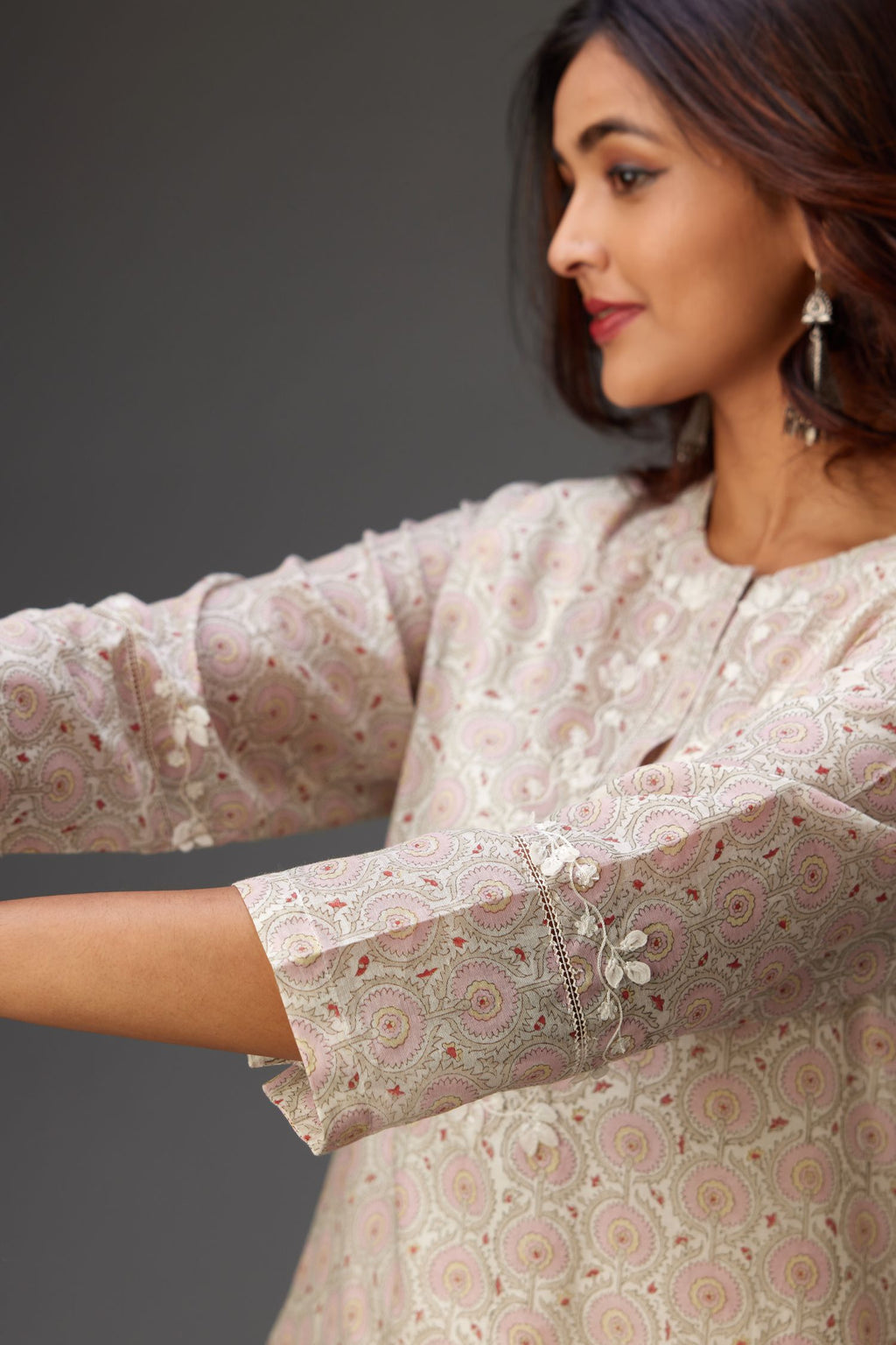 Silk chanderi hand-block printed straight kurta set with sequins work and chiffon flower embroidery.