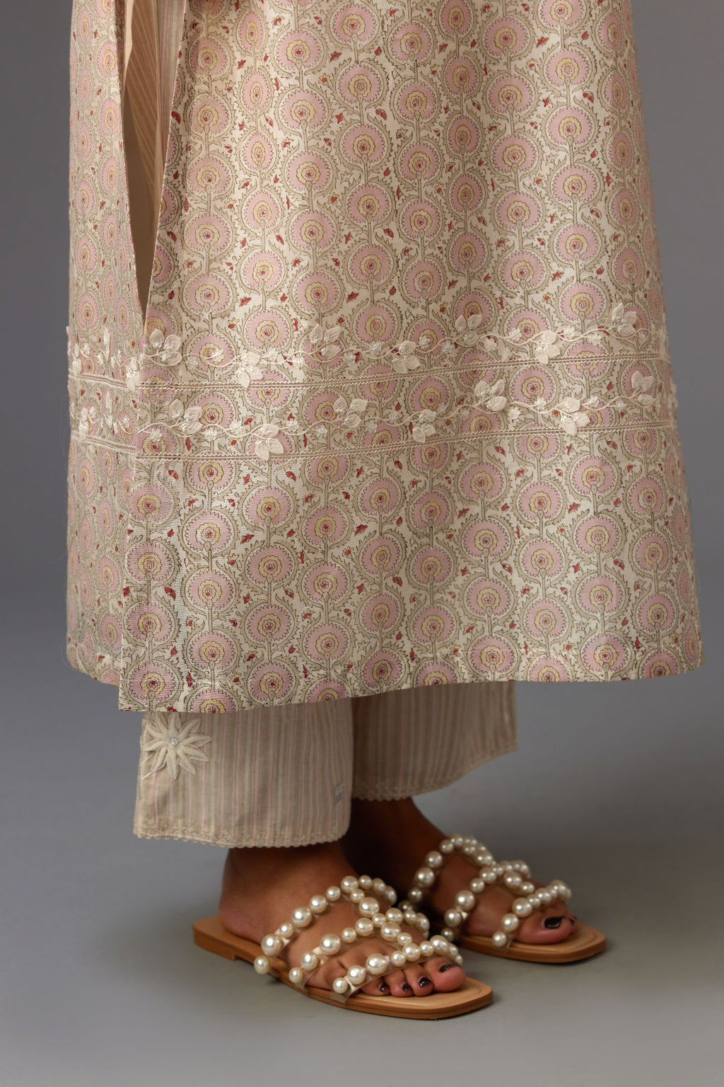 Silk chanderi hand-block printed straight kurta set with sequins work and chiffon flower embroidery.