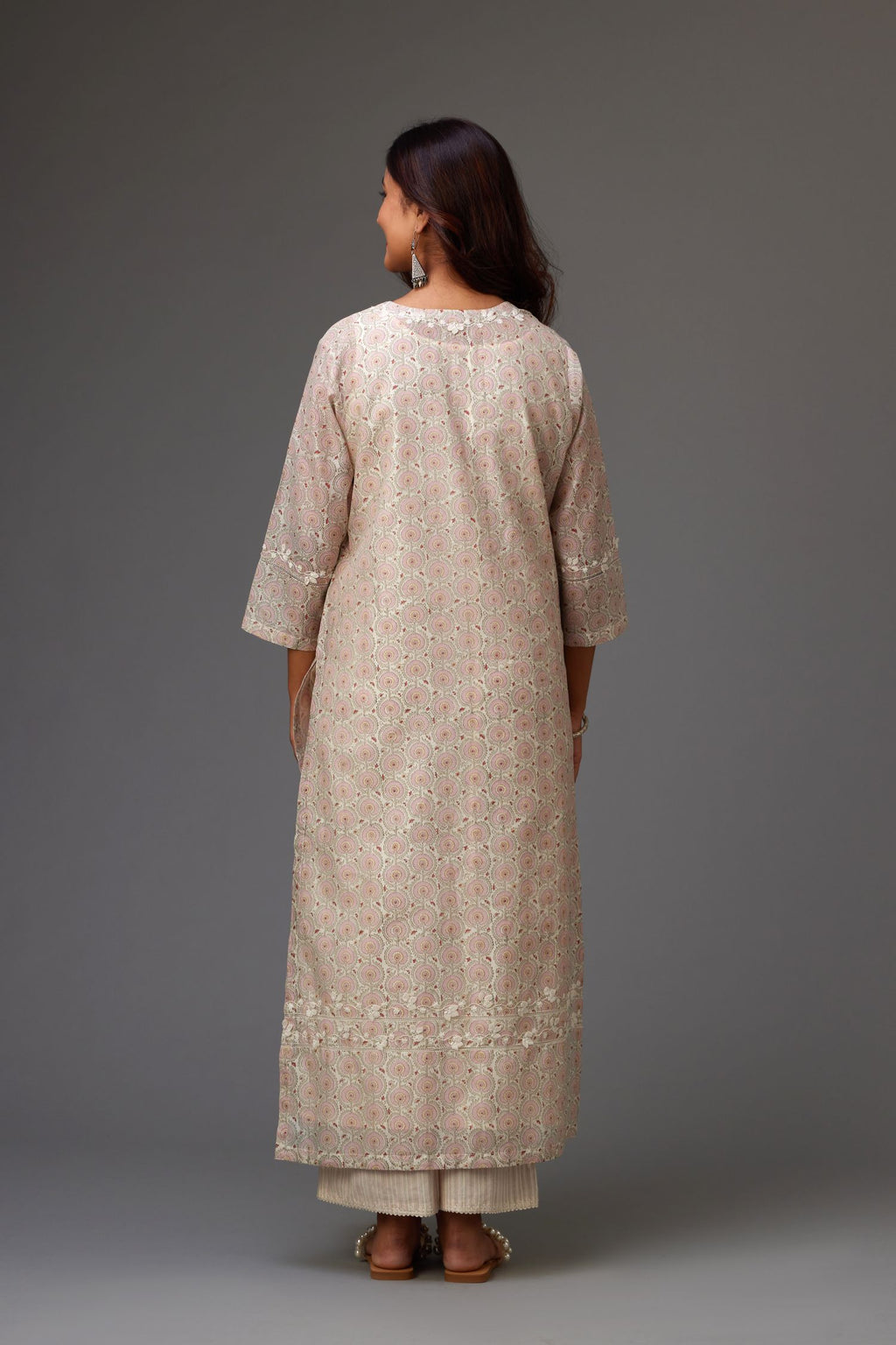 Silk chanderi hand-block printed straight kurta set with sequins work and chiffon flower embroidery.