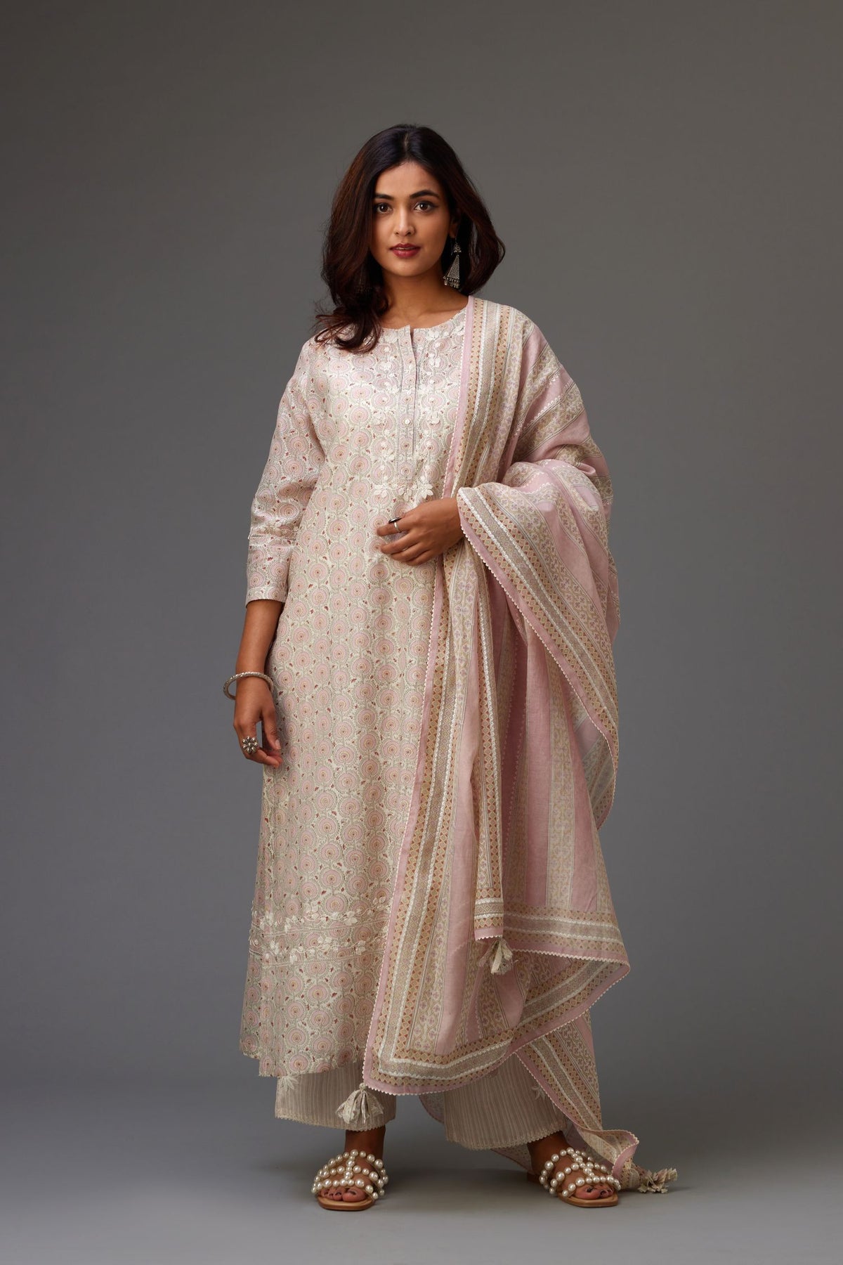 Silk chanderi hand-block printed straight kurta set with sequins work and chiffon flower embroidery.