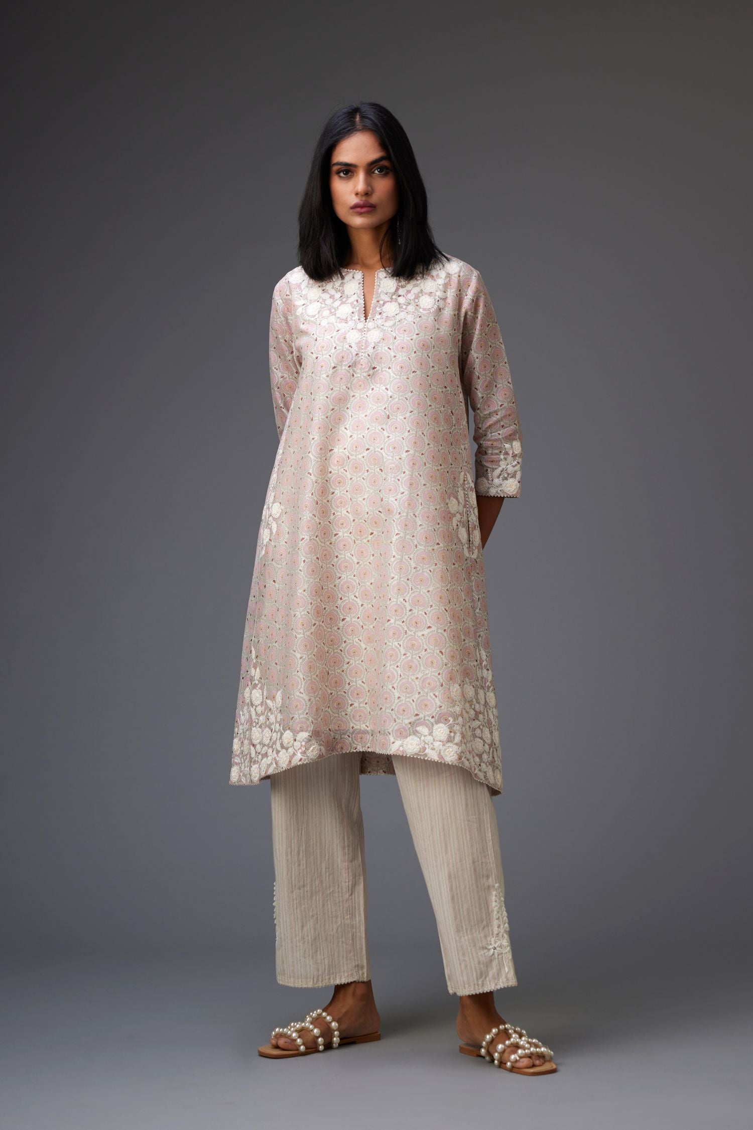 Pink & grey hand block printed short A-line kurta set with appliqué embroidery, highlighted with ric rac lace and sequins.