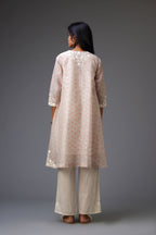 Pink & grey hand block printed short A-line kurta set with appliqué embroidery, highlighted with ric rac lace and sequins.