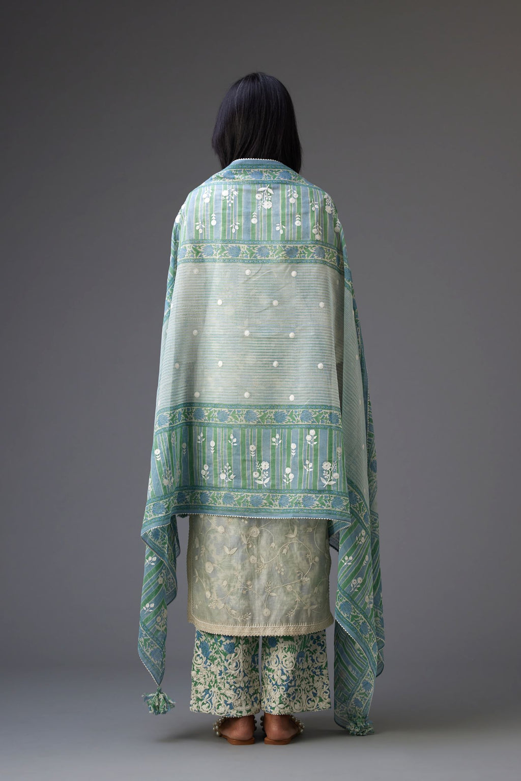Blue & green hand block printed dupatta with all over assorted flower embroidery, finished with ric rac lace.