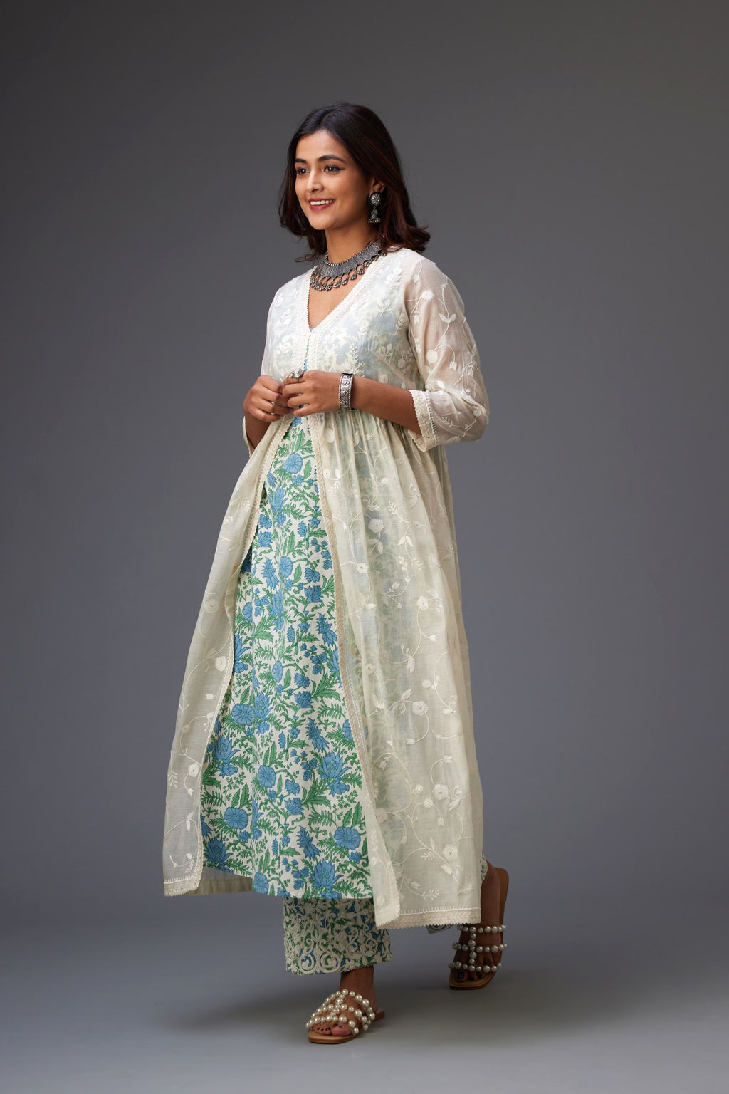 Off-white cotton chanderi front open kurta set with all over tonal jaal embroidery, highlighted with sequins, beaded work and ric-rac.