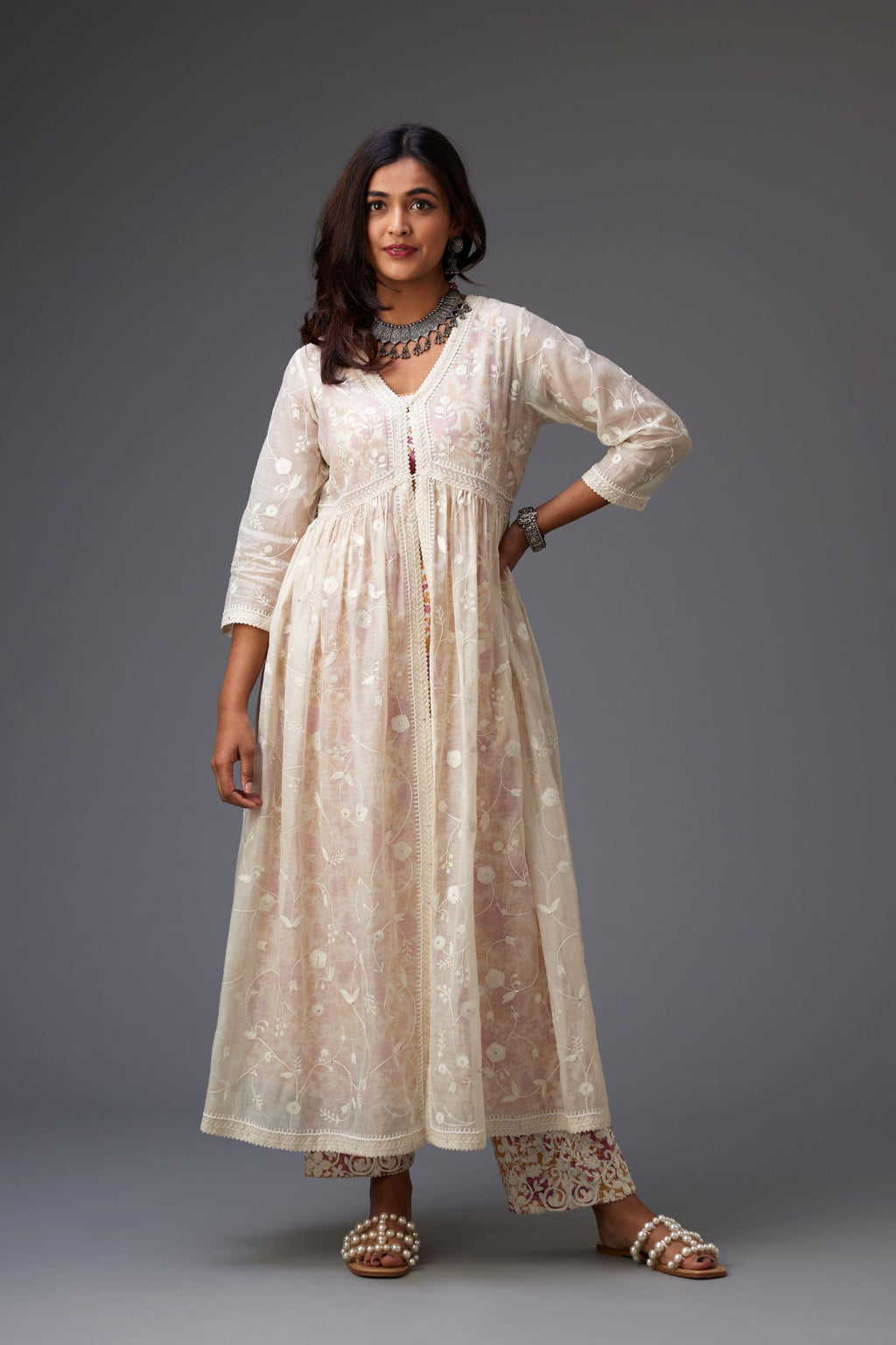Off-white cotton chanderi front open kurta set with all over tonal jaal embroidery, highlighted with sequins, beaded work and ric-rac.