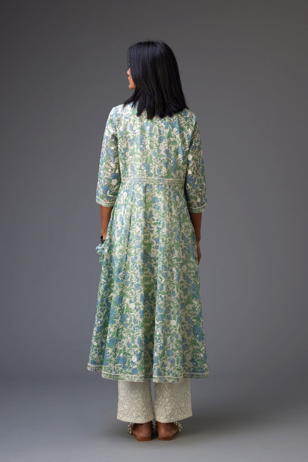 Blue and green hand block printed angrakha kurta set with white thread embroidery and sequins work all over.