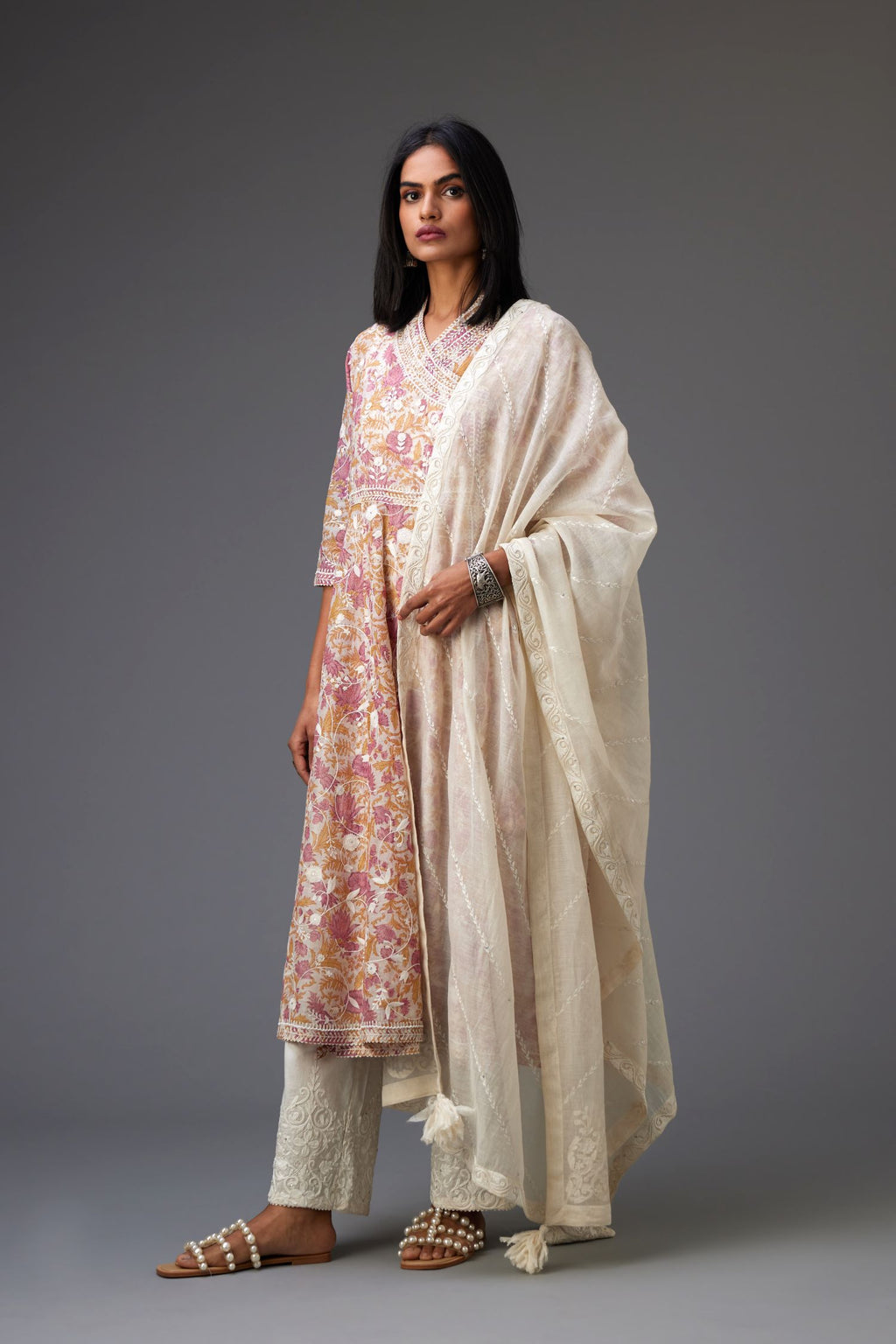 Off-white cotton chanderi dupatta with dori embroidery border at the edges and diagonal thread embroidered lines all-over the dupatta.