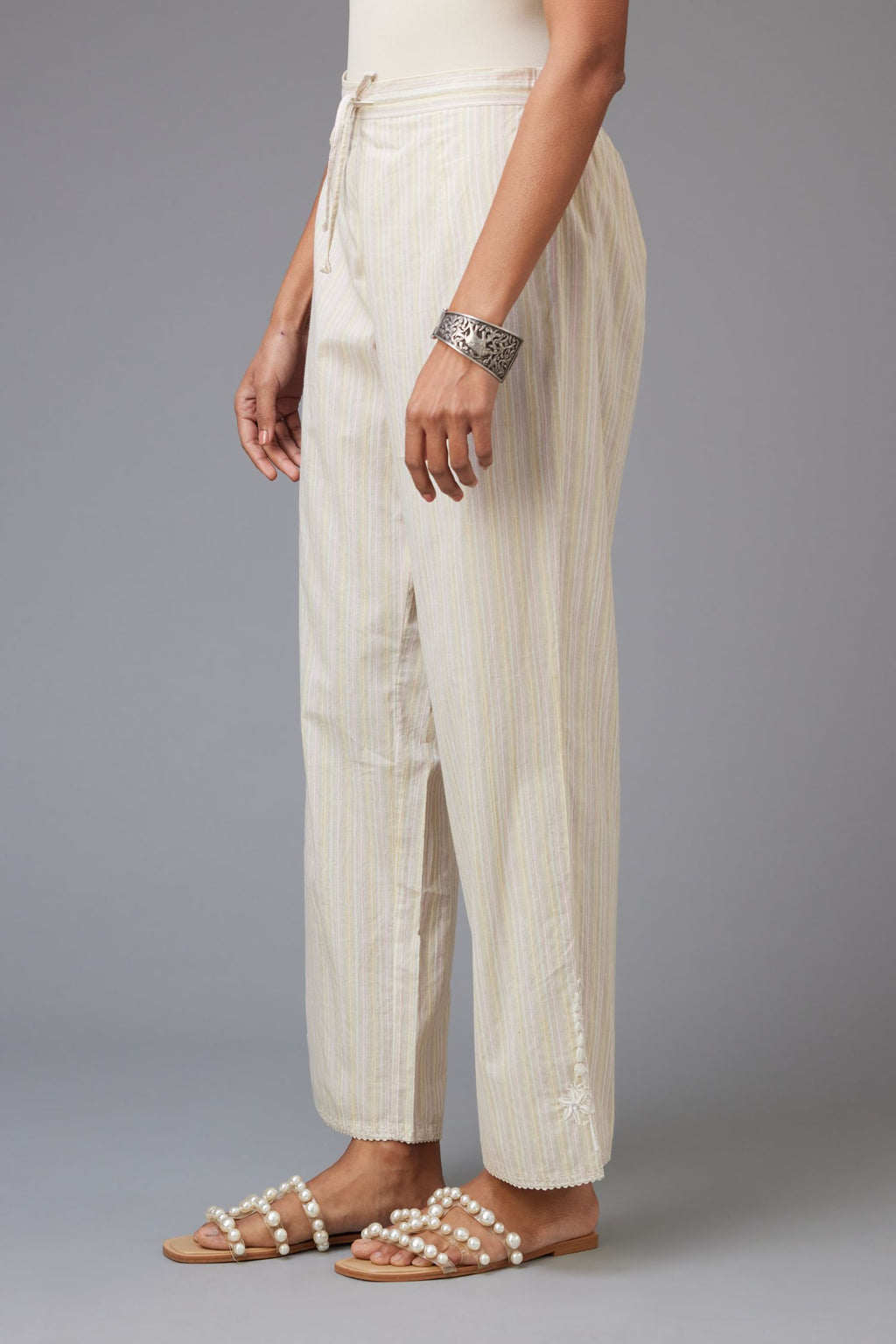 Yellow & pink printed stripe Cotton straight pants with a chiffon embroidered boota at the hem.