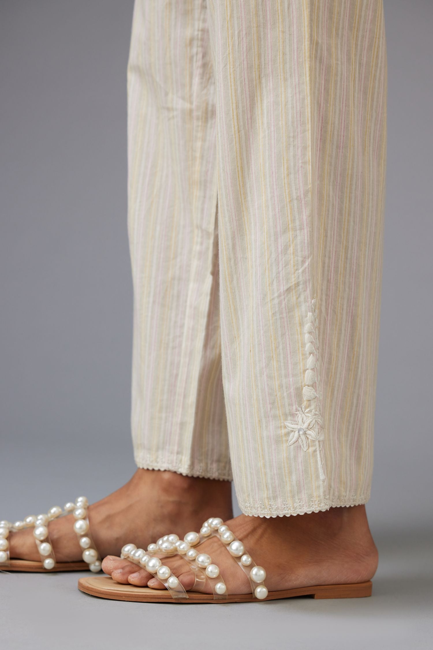 Yellow & pink printed stripe Cotton straight pants with a chiffon embroidered boota at the hem.