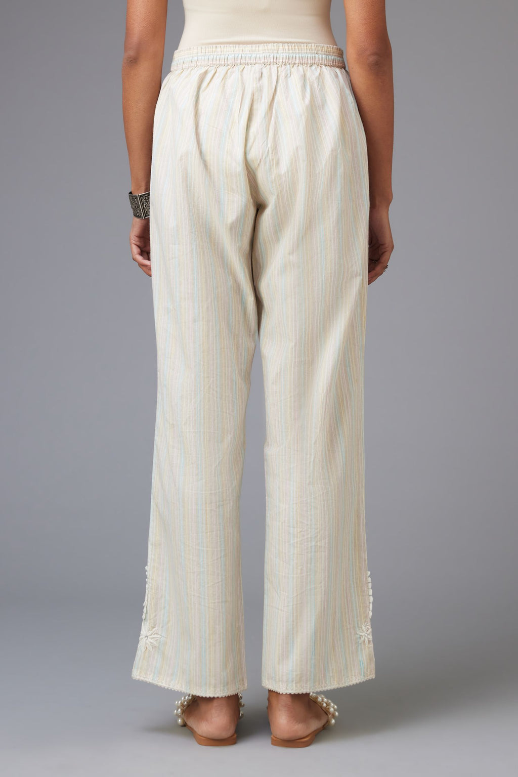 Multi printed stripe Cotton straight pants with a chiffon embroidered boota at the hem.