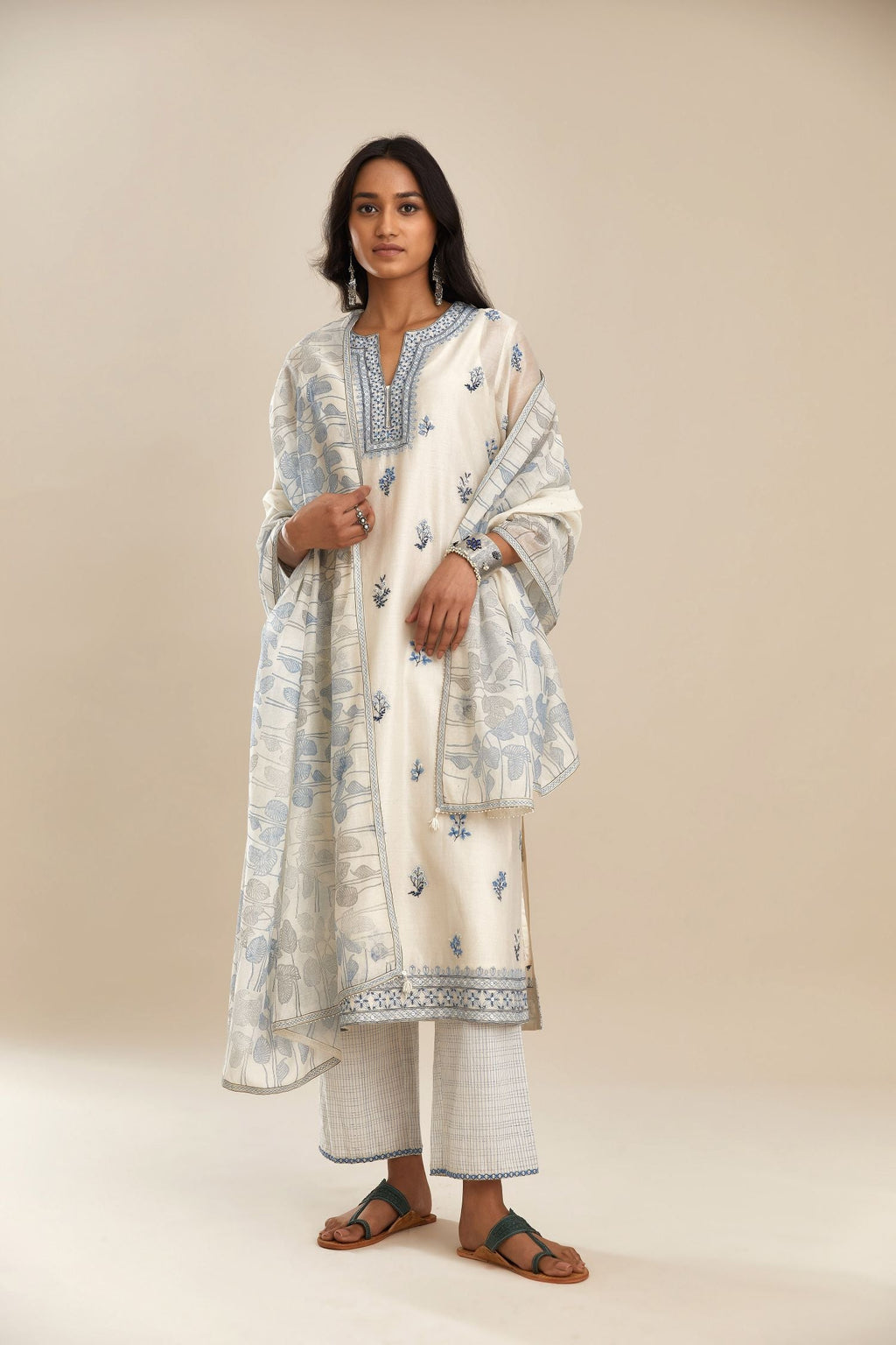 Off-white silk Chanderi straight kurta set.