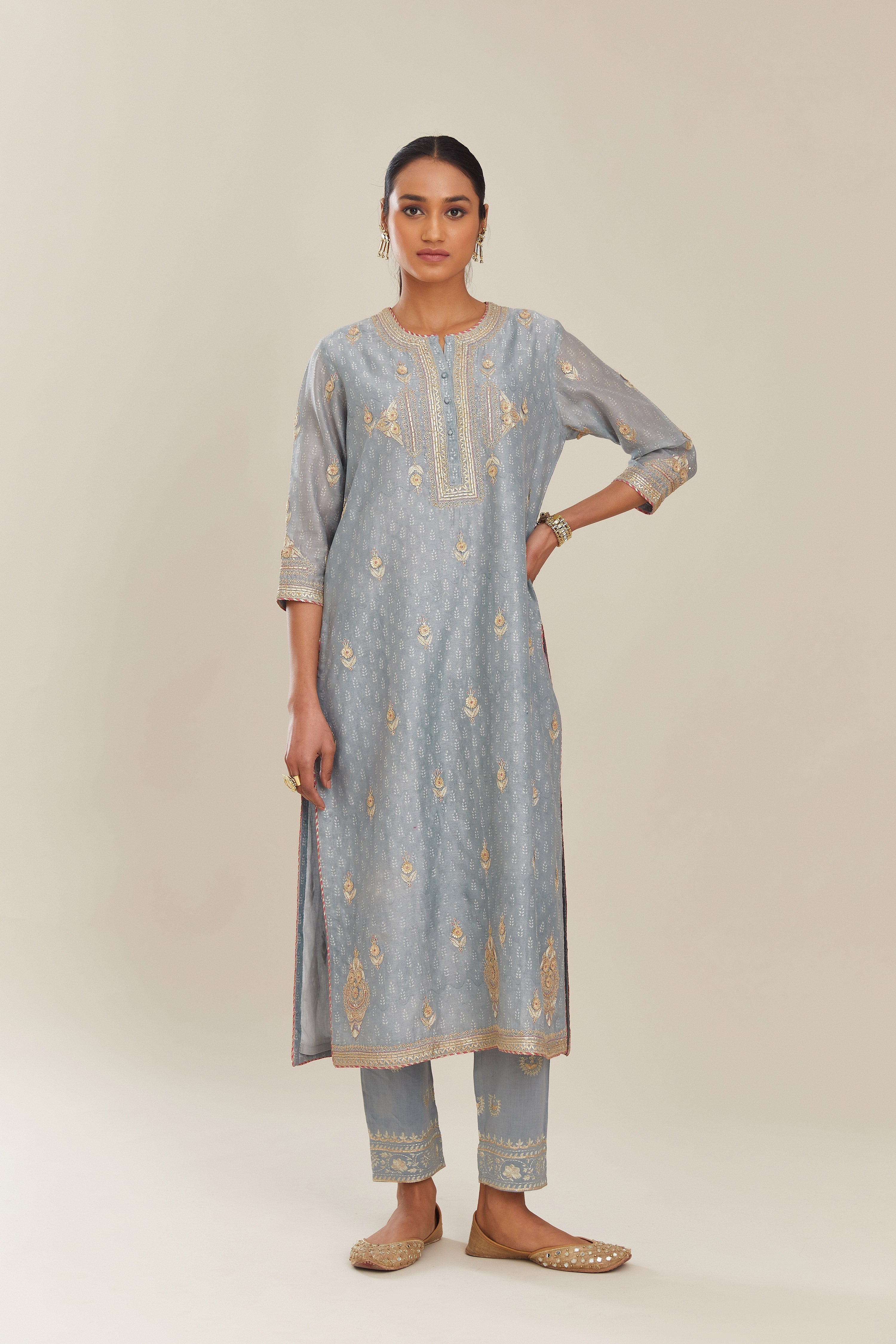 Powder blue silk chanderi straight kurta set with gold gota and zari embroidery.