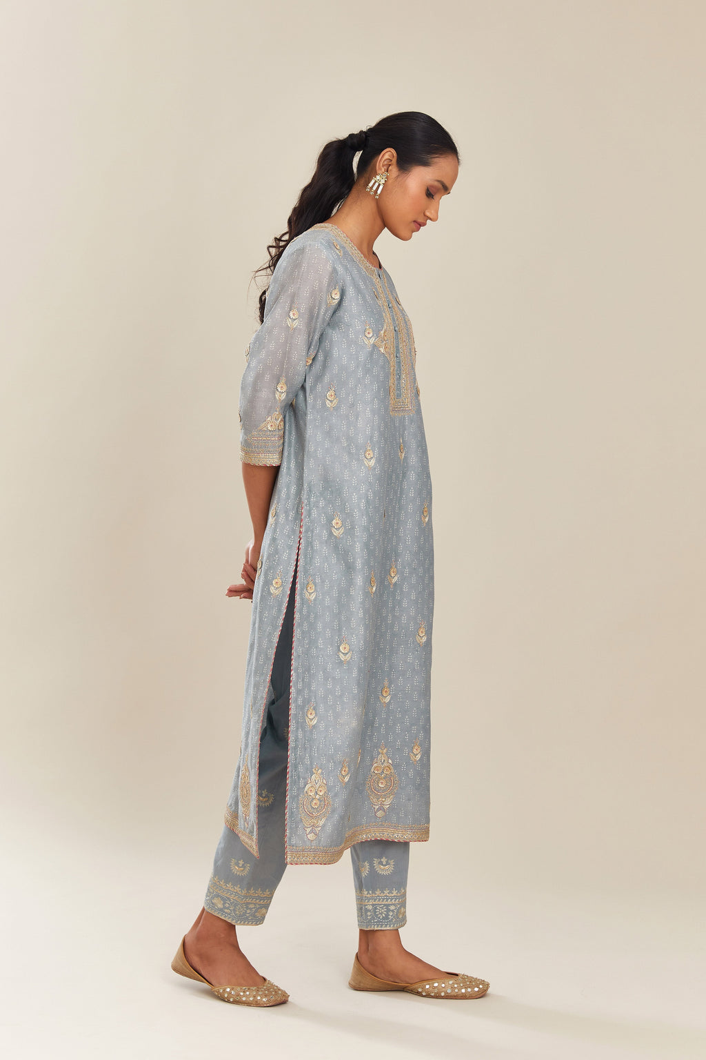 Powder blue silk chanderi straight kurta set with gold gota and zari embroidery.