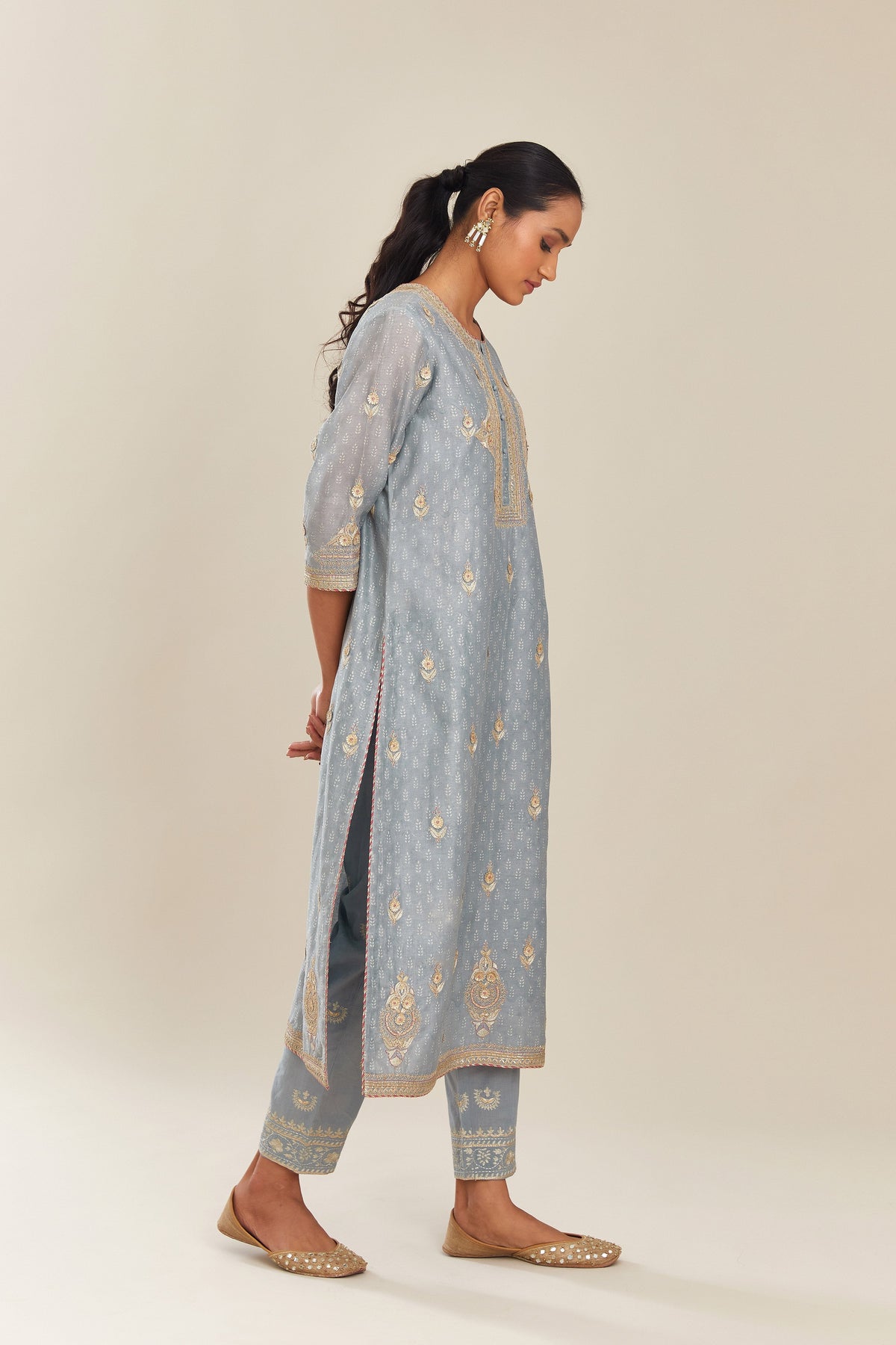 Powder blue silk chanderi straight kurta set with gold gota and zari embroidery.