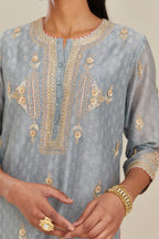 Powder blue silk chanderi straight kurta set with gold gota and zari embroidery.