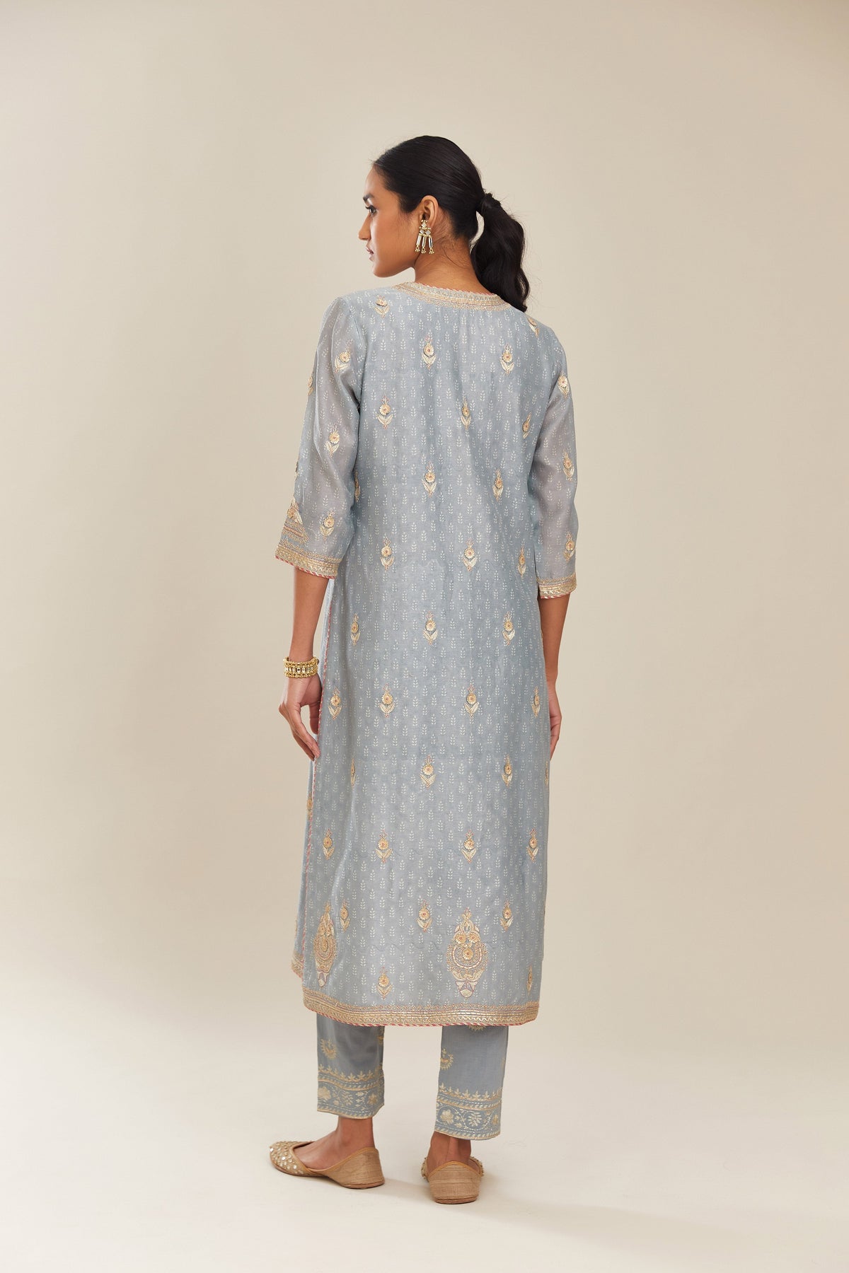 Powder blue silk chanderi straight kurta set with gold gota and zari embroidery.