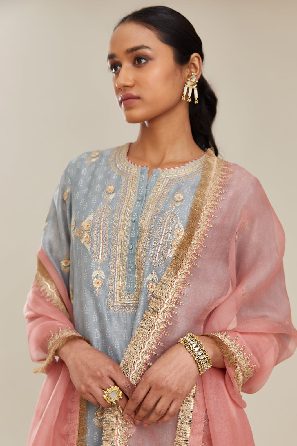 Powder blue silk chanderi straight kurta set with gold gota and zari embroidery.