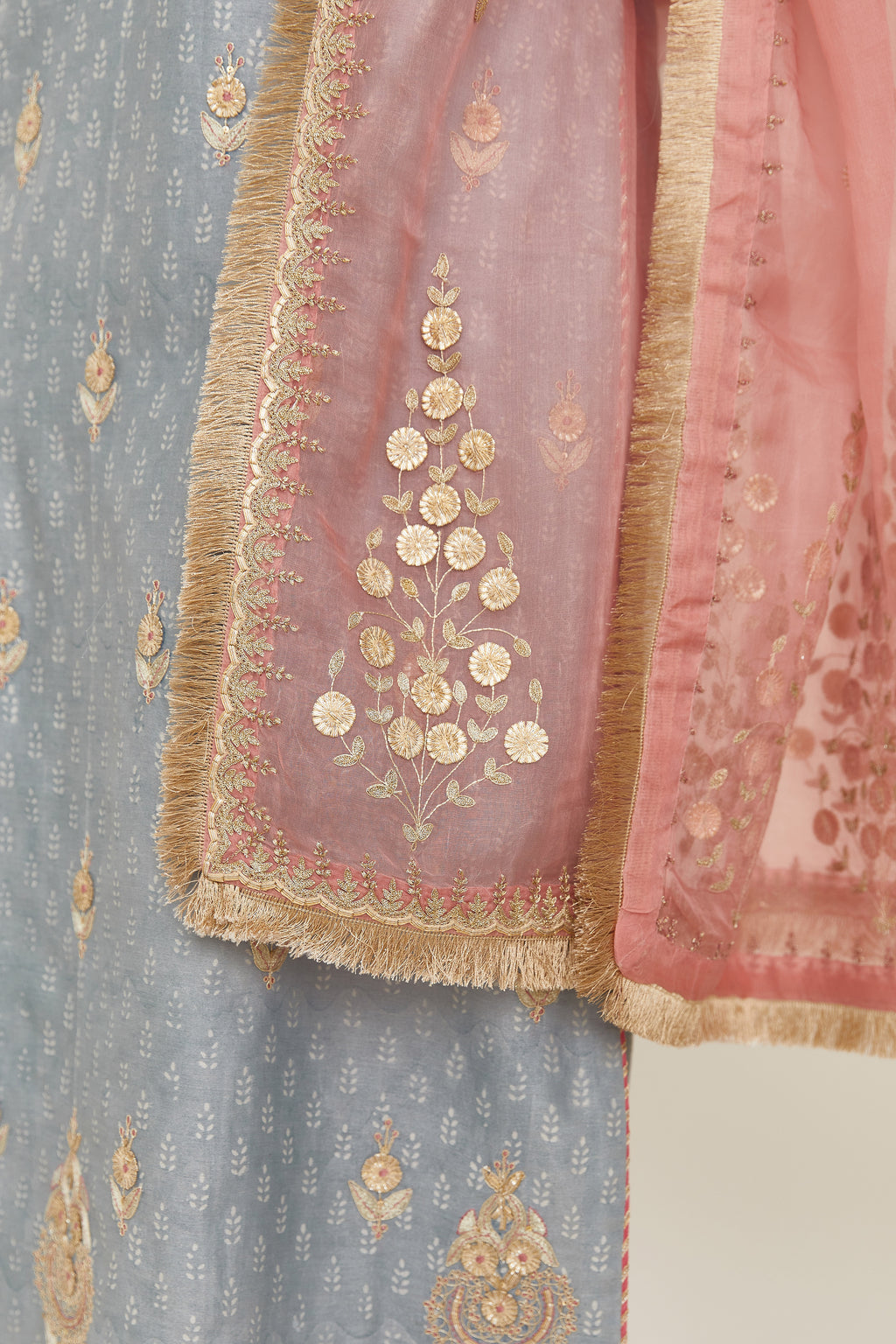 Pink silk organza dupatta with delicate gold zari and gota embroidery border running along all edges.