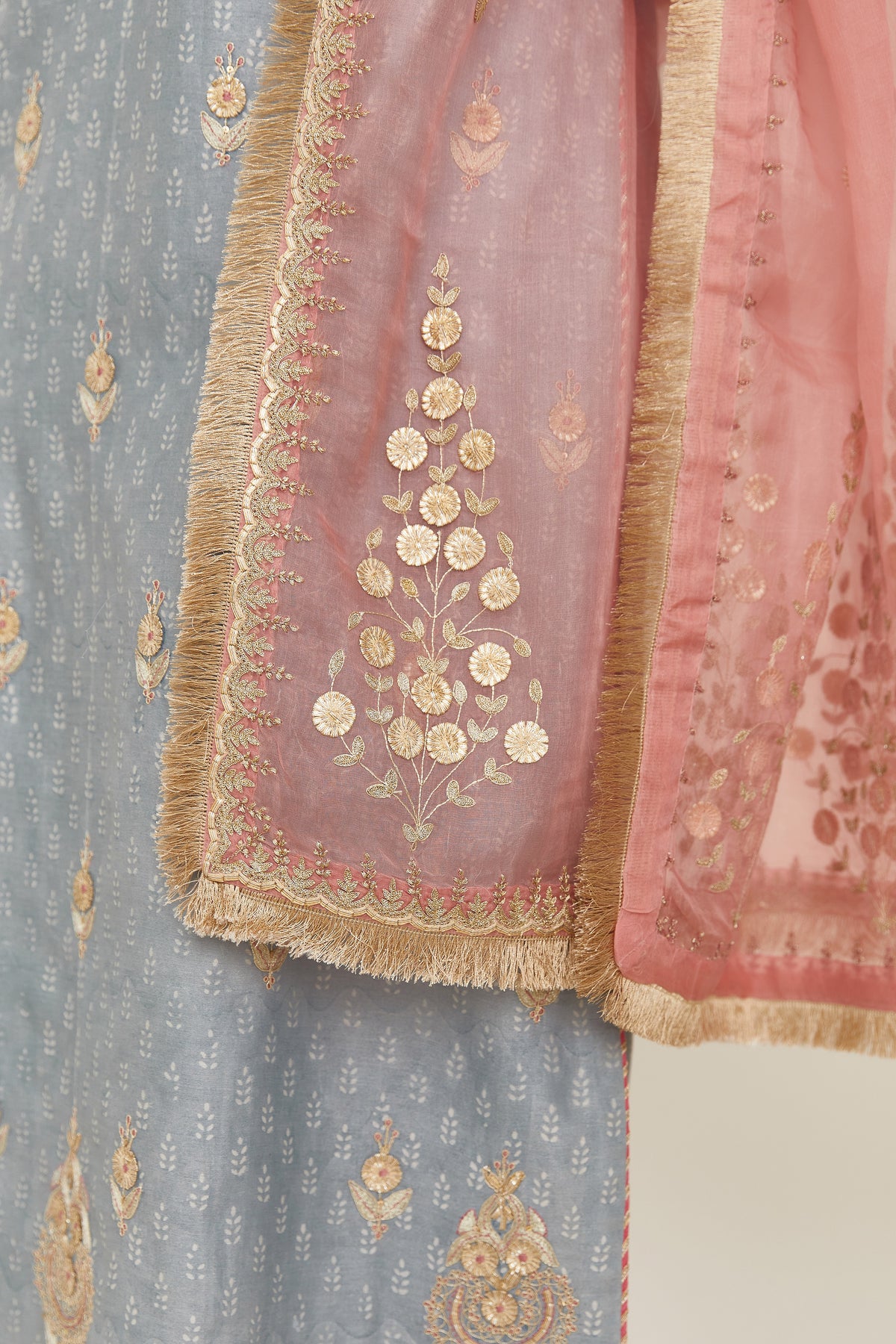 Pink silk organza dupatta with delicate gold zari and gota embroidery border running along all edges.